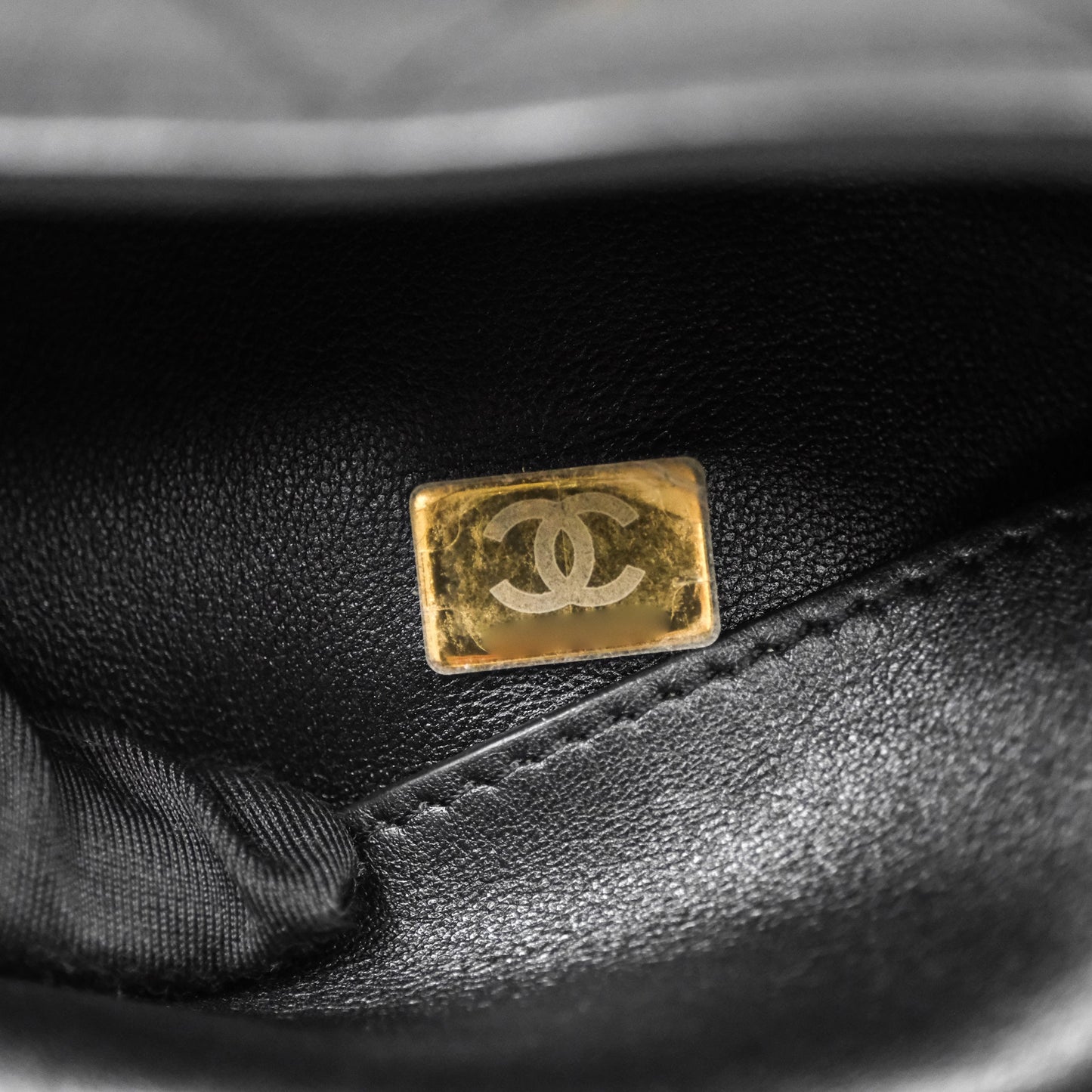 Chanel Quilted Drawstring Bucket Bag Black Calfskin Aged Gold Hardware