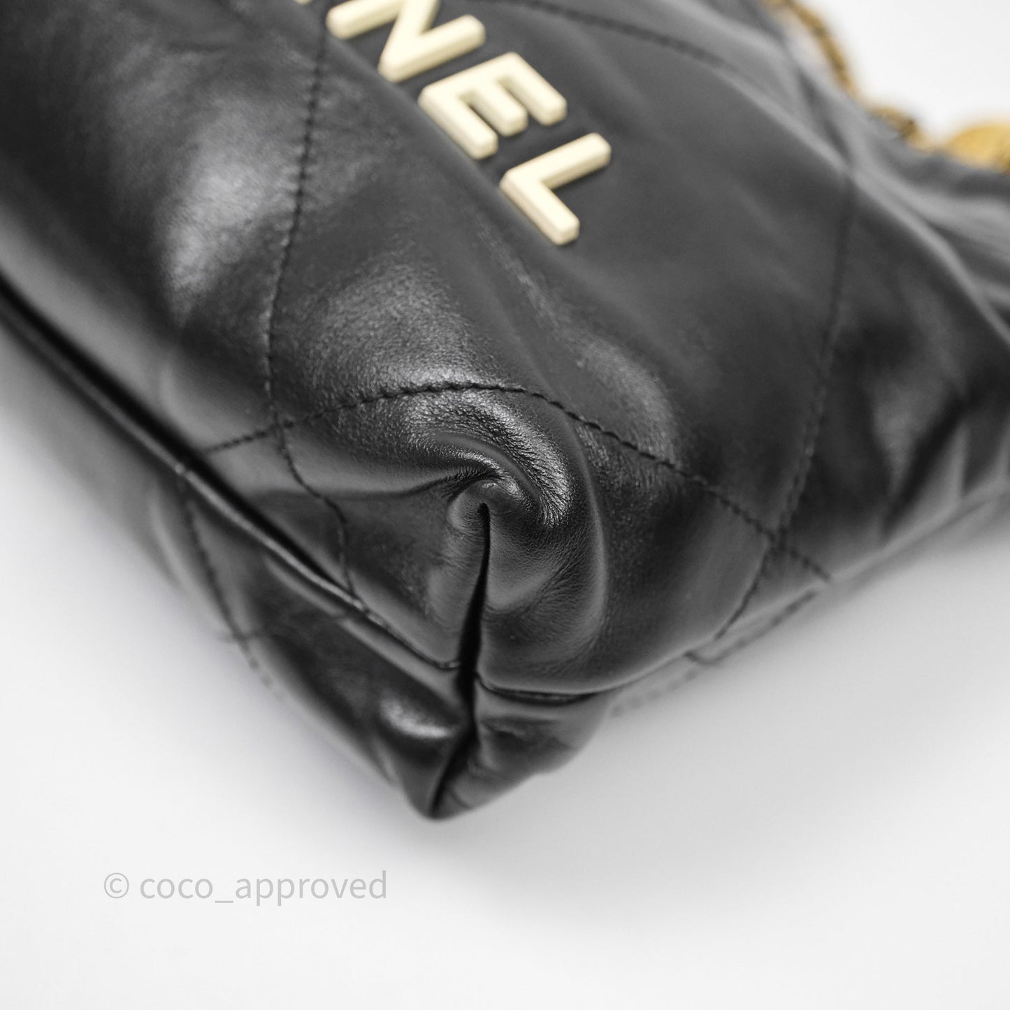 Chanel 22 Mini Bag Black Crumpled Calfskin White Lacquered Metal Logo