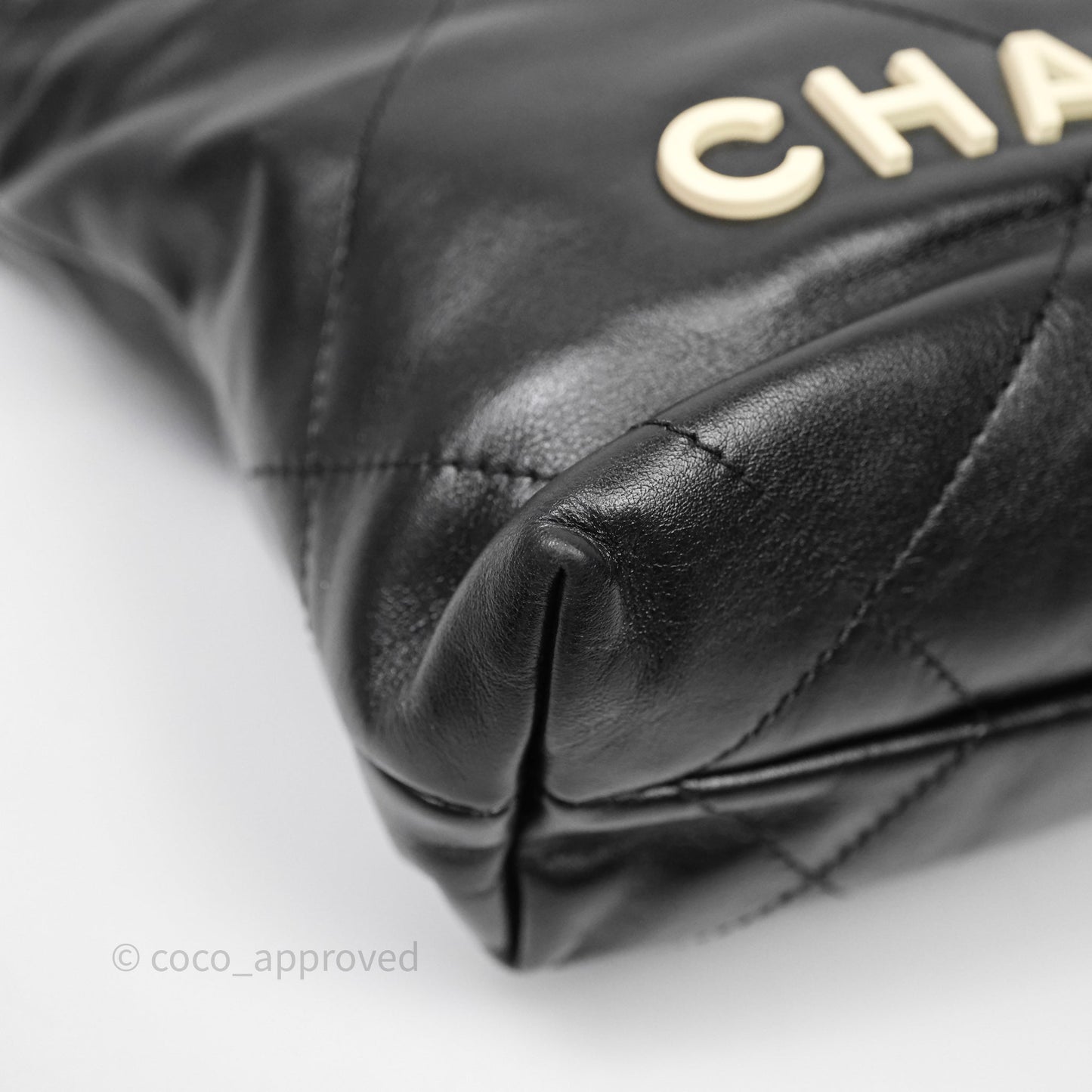 Chanel 22 Mini Bag Black Crumpled Calfskin White Lacquered Metal Logo