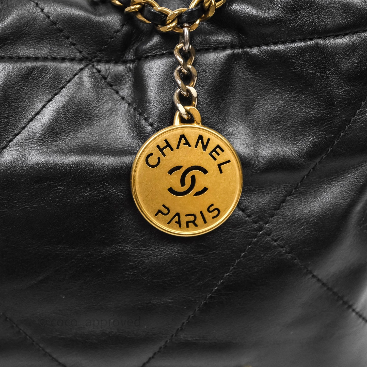 Chanel 22 Mini Bag Black Crumpled Calfskin White Lacquered Metal Logo