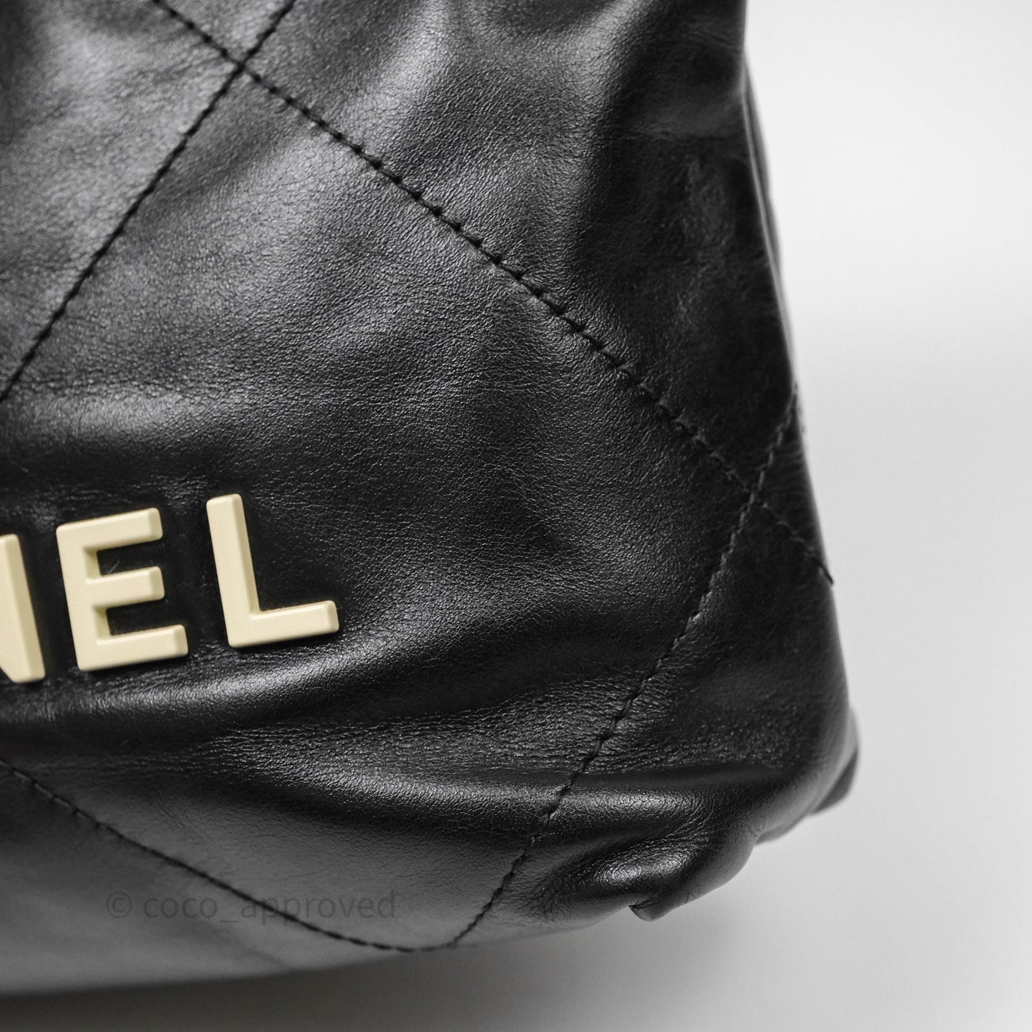 Chanel 22 Mini Bag Black Crumpled Calfskin White Lacquered Metal Logo