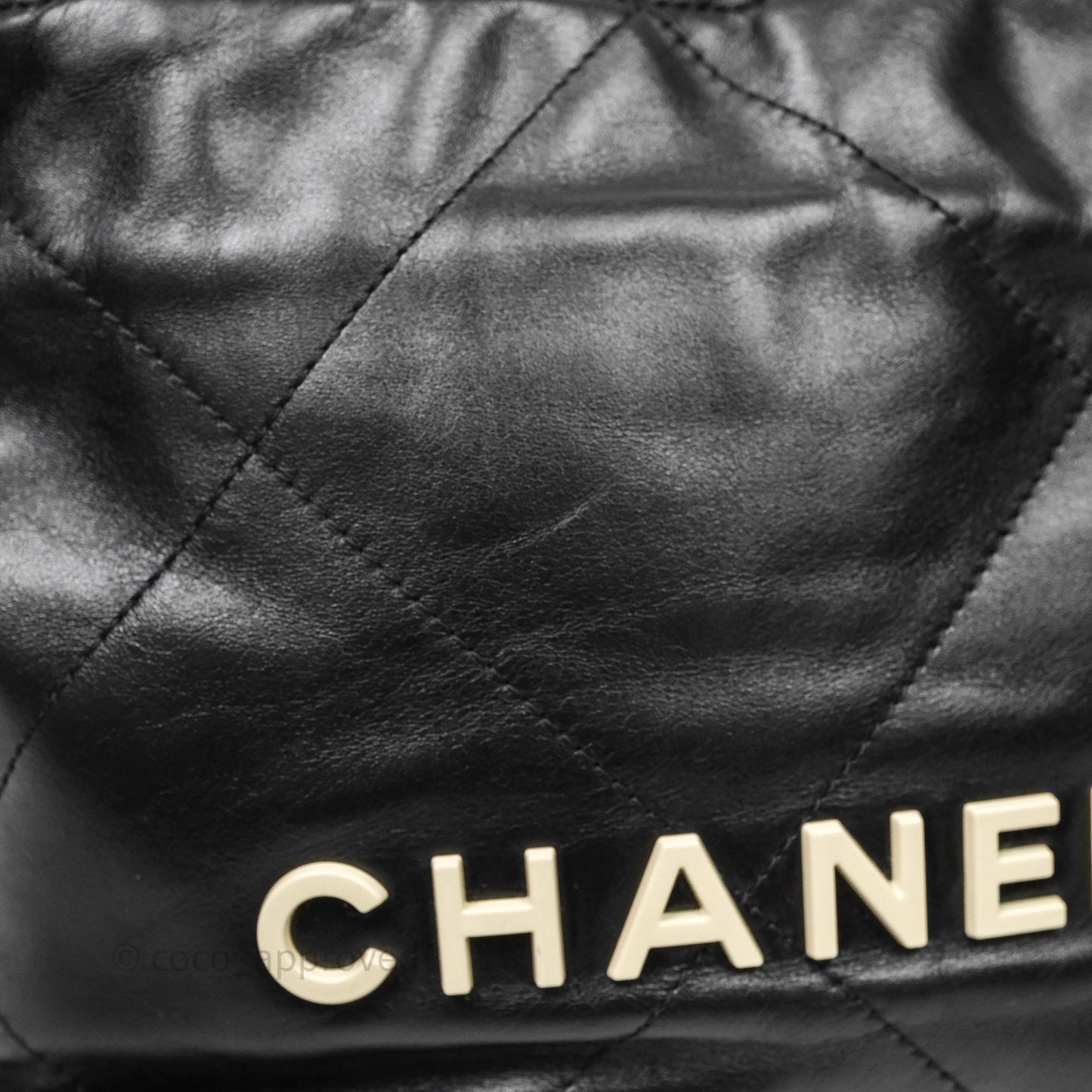 Chanel 22 Mini Bag Black Crumpled Calfskin White Lacquered Metal Logo