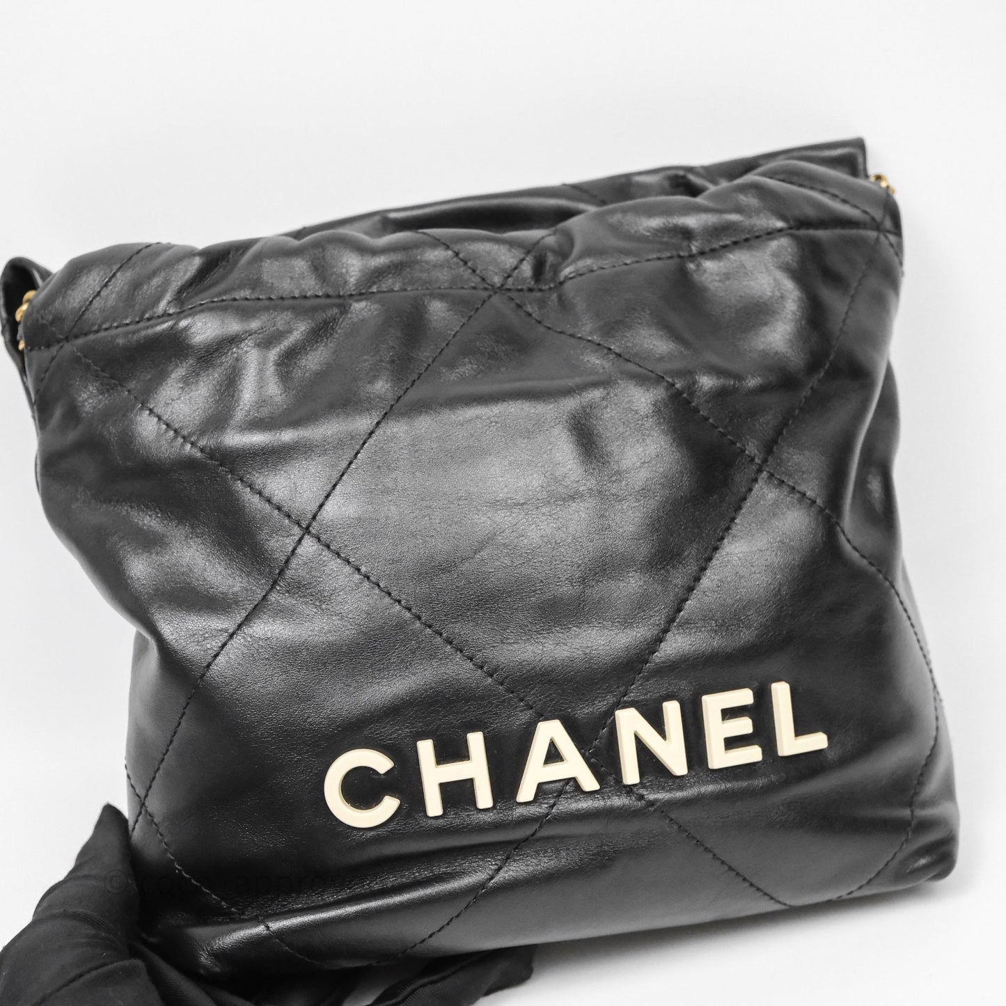 Chanel 22 Mini Bag Black Crumpled Calfskin White Lacquered Metal Logo