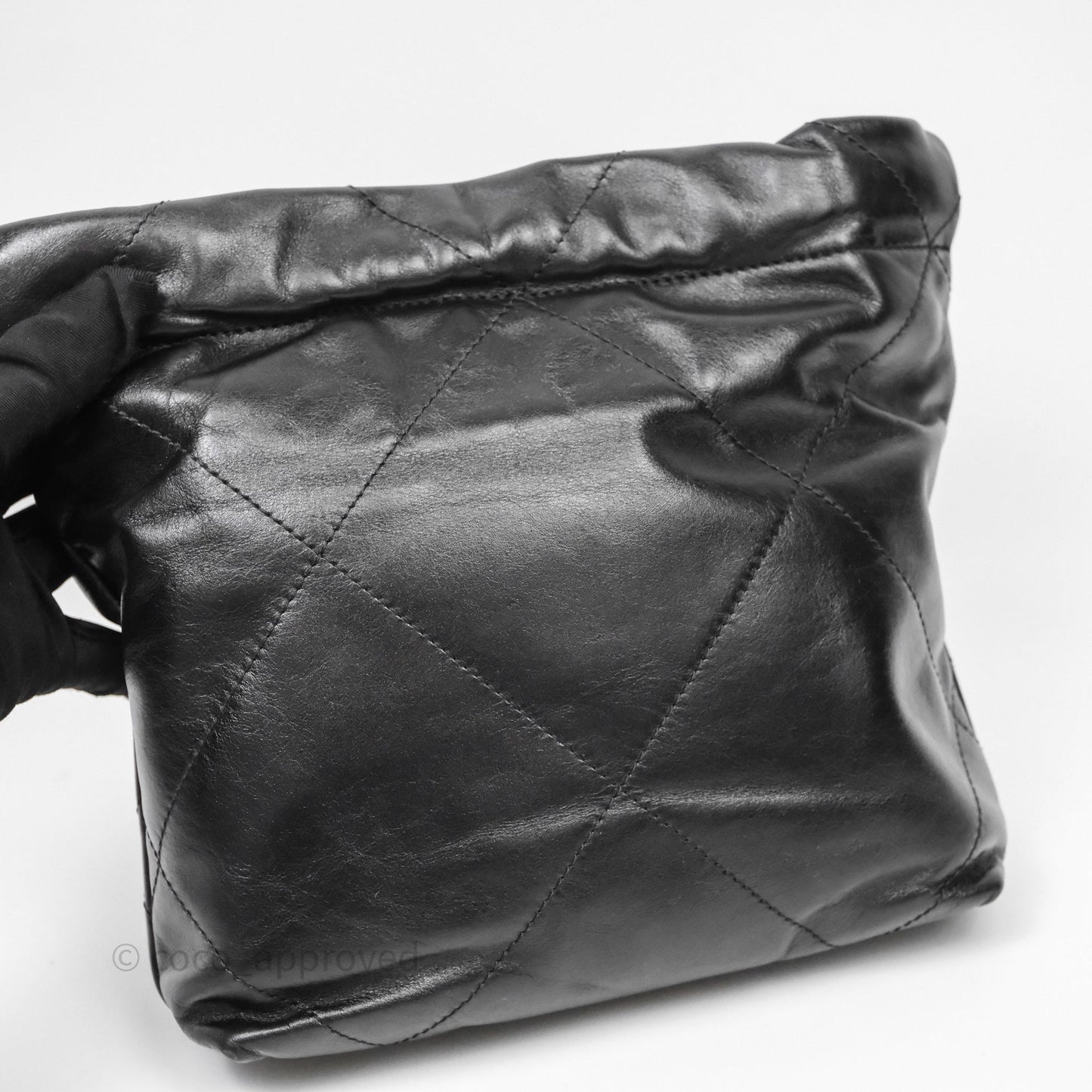 Chanel 22 Mini Bag Black Crumpled Calfskin White Lacquered Metal Logo