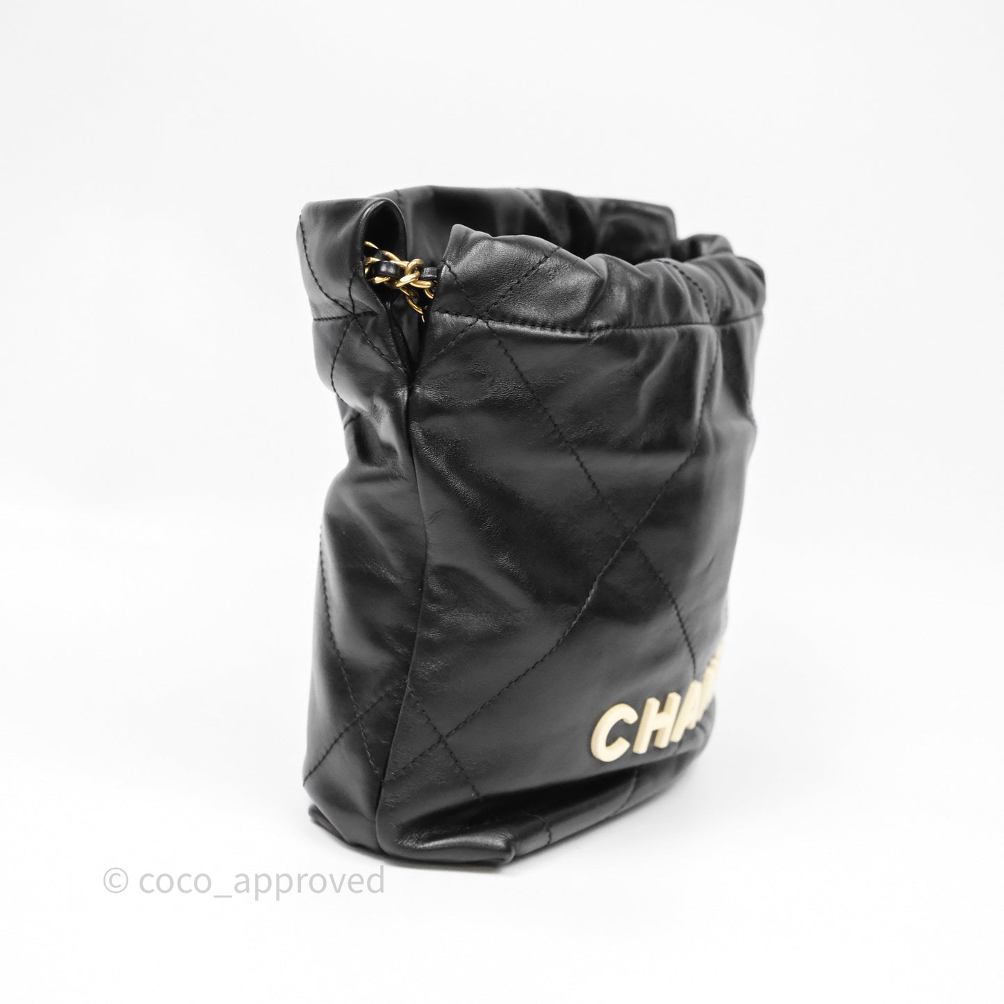 Chanel 22 Mini Bag Black Crumpled Calfskin White Lacquered Metal Logo