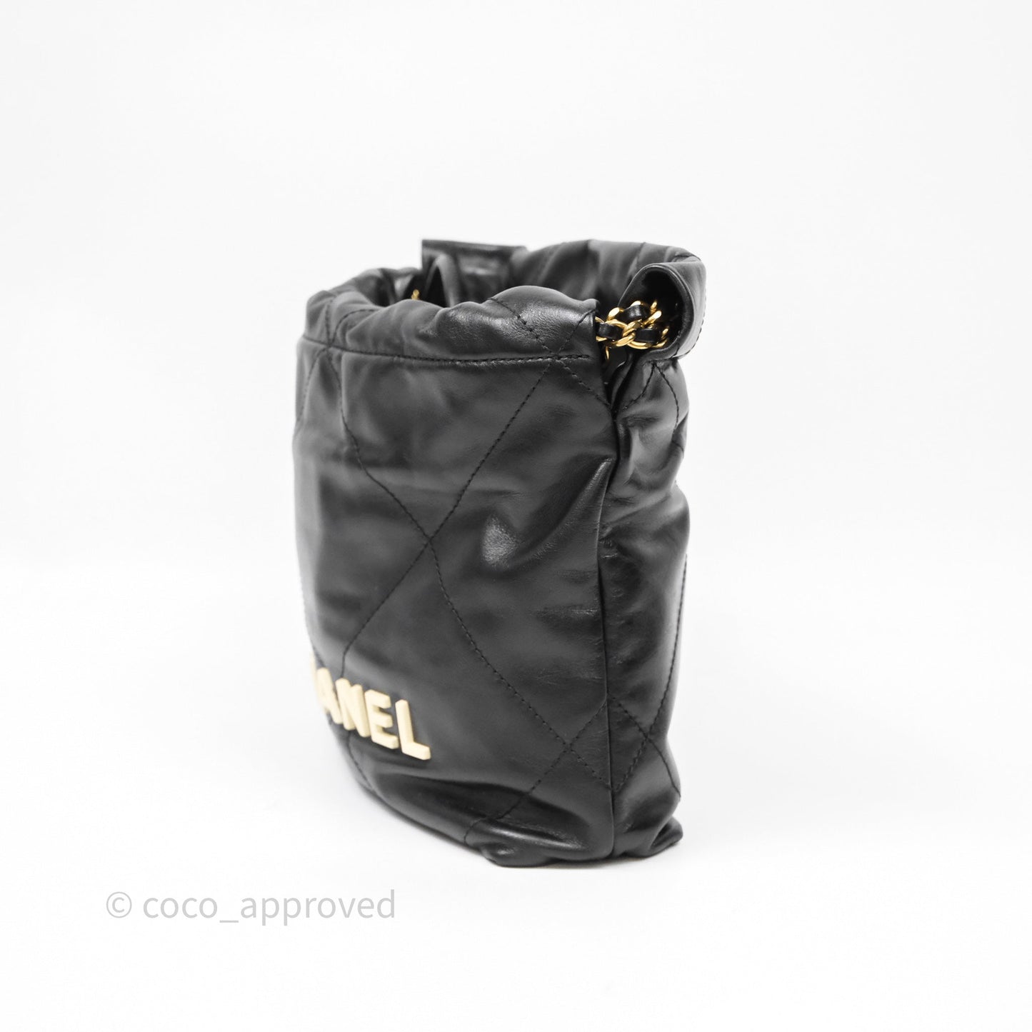 Chanel 22 Mini Bag Black Crumpled Calfskin White Lacquered Metal Logo