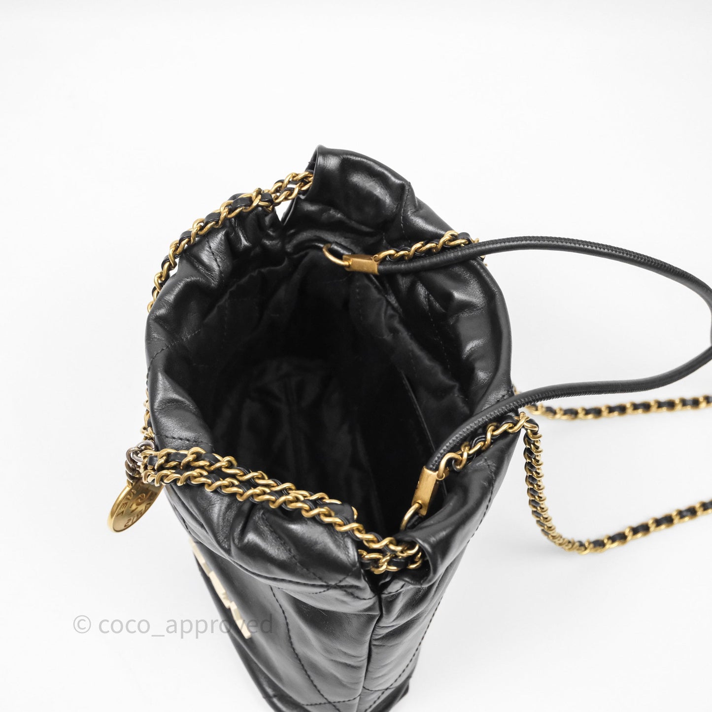 Chanel 22 Mini Bag Black Crumpled Calfskin White Lacquered Metal Logo