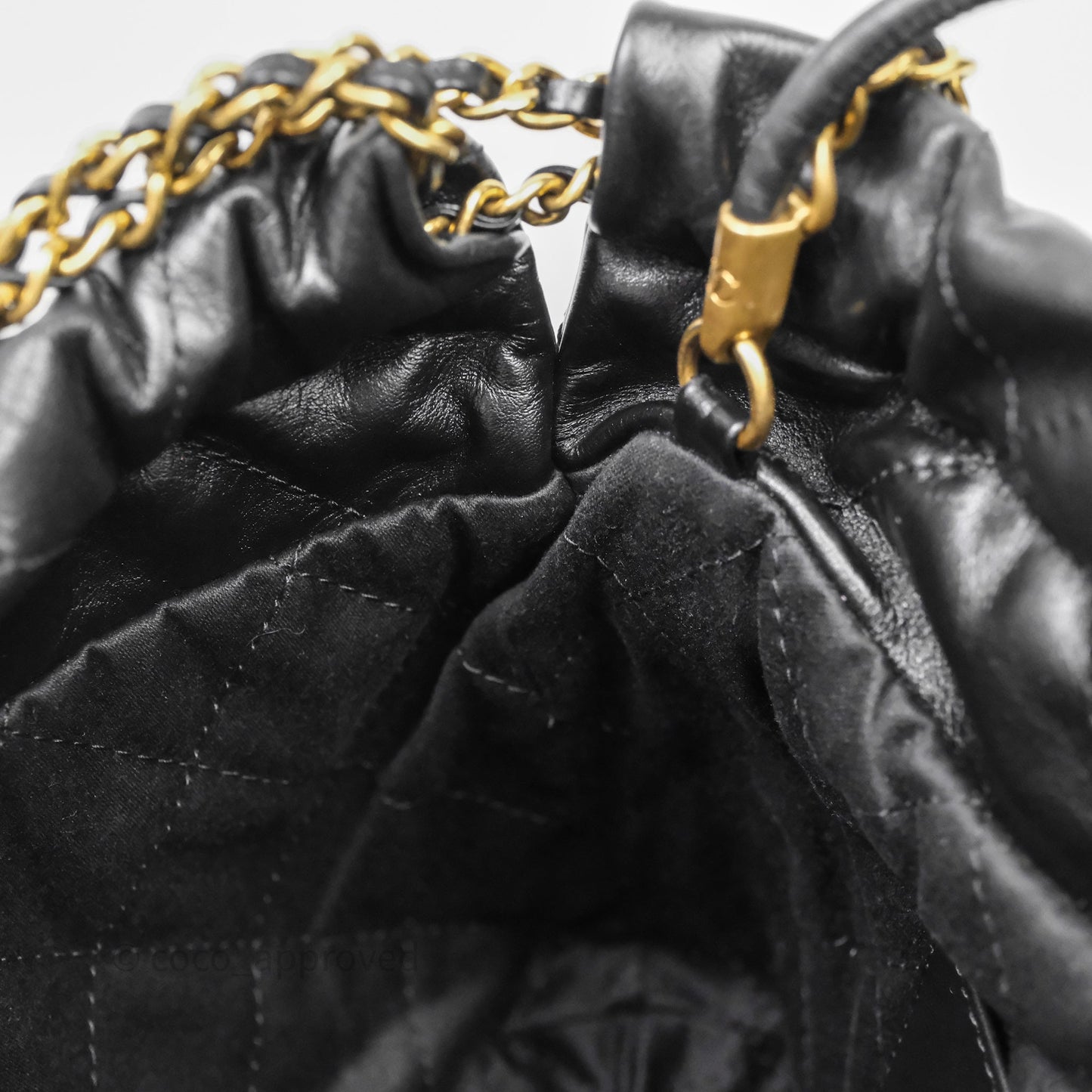 Chanel 22 Mini Bag Black Crumpled Calfskin White Lacquered Metal Logo