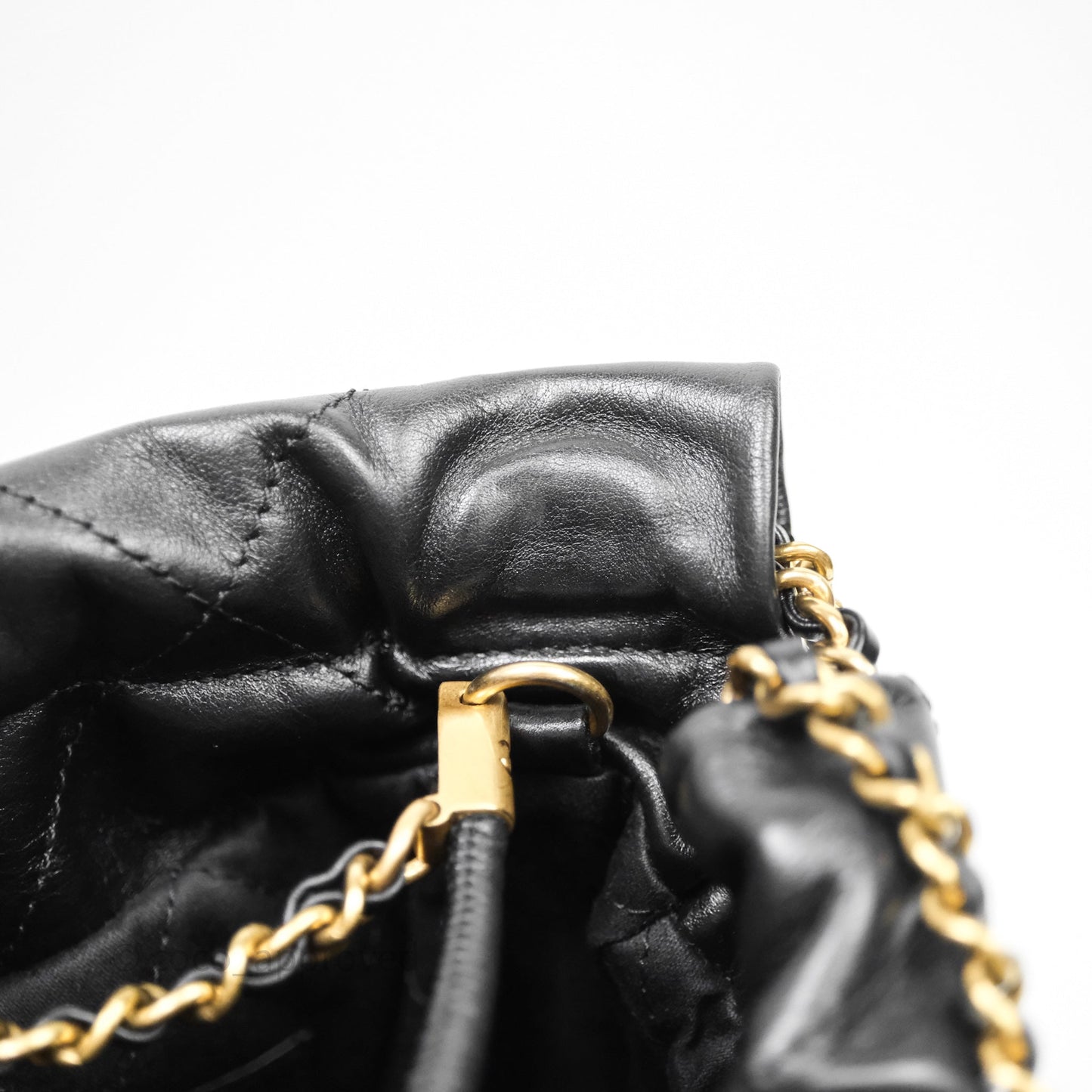 Chanel 22 Mini Bag Black Crumpled Calfskin White Lacquered Metal Logo