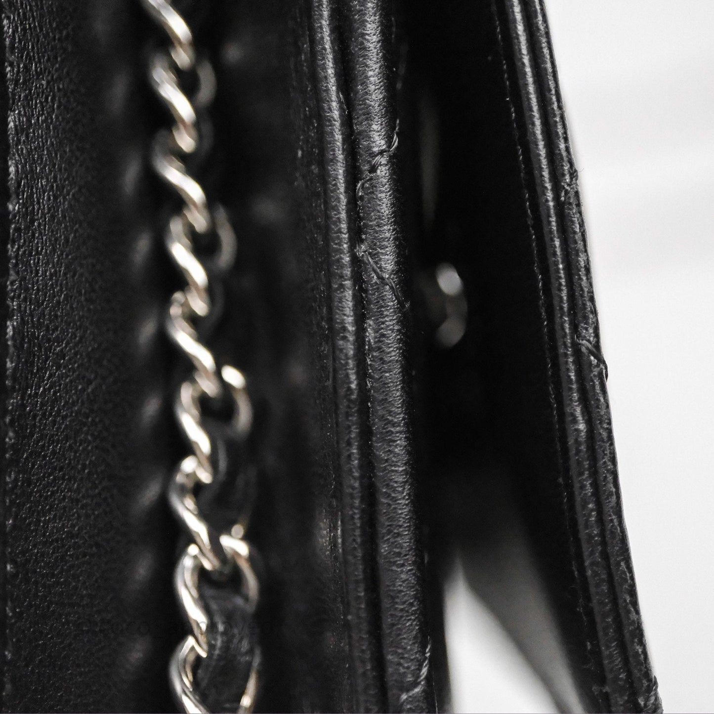 Chanel Quilted WOC Black Lambskin Silver Hardware