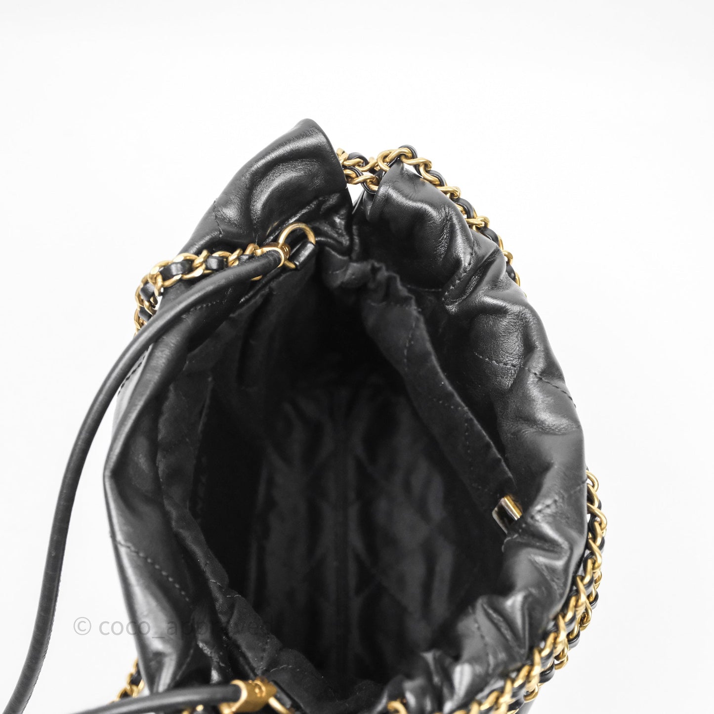 Chanel 22 Mini Bag Black Crumpled Calfskin White Lacquered Metal Logo