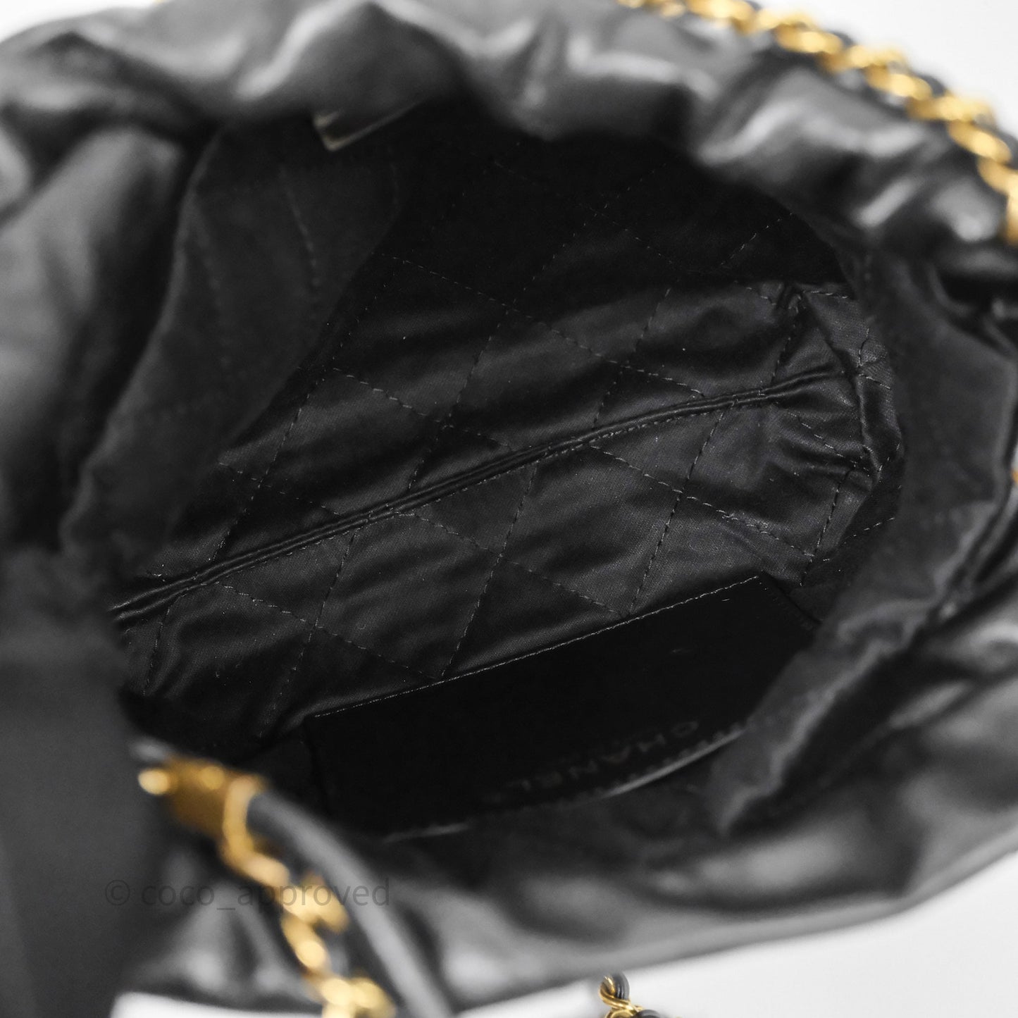 Chanel 22 Mini Bag Black Crumpled Calfskin White Lacquered Metal Logo