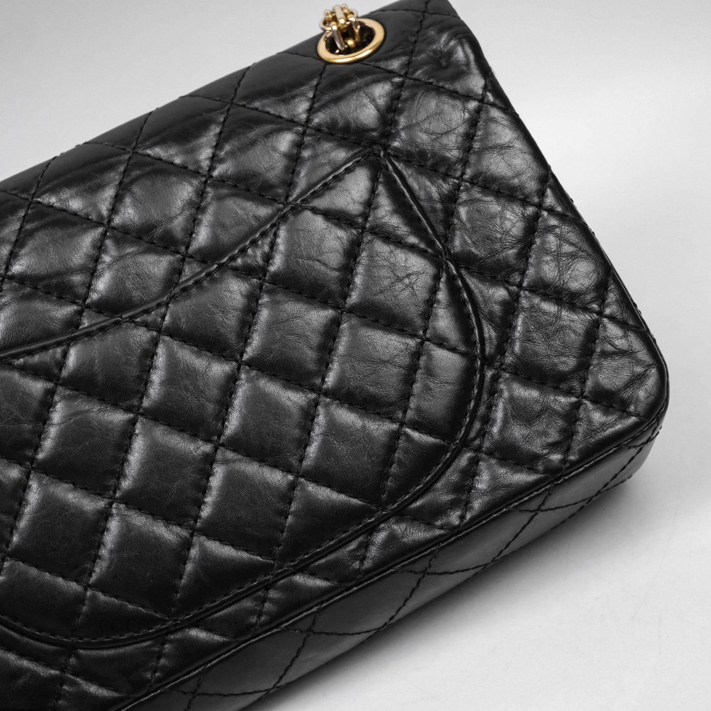 Chanel Reissue 225 Quilted Black Calfskin Aged Gold Hardware