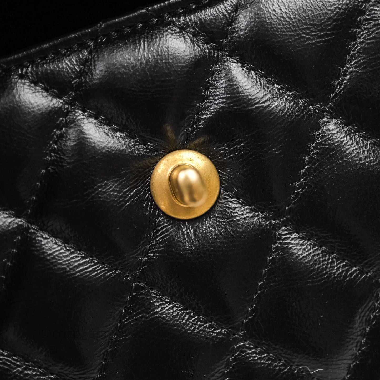 Chanel Kelly Bag Quilted Black Shiny Crumpled Calfskin Aged Gold Hardware