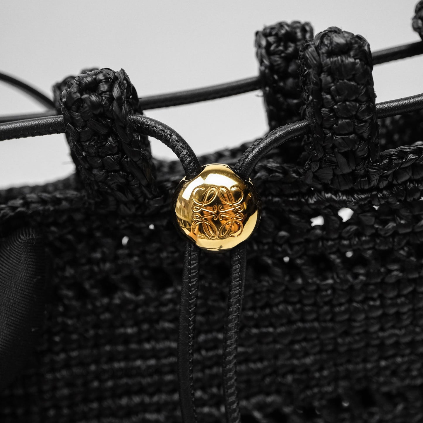 Loewe Drawstring Pocket In Raffia Black