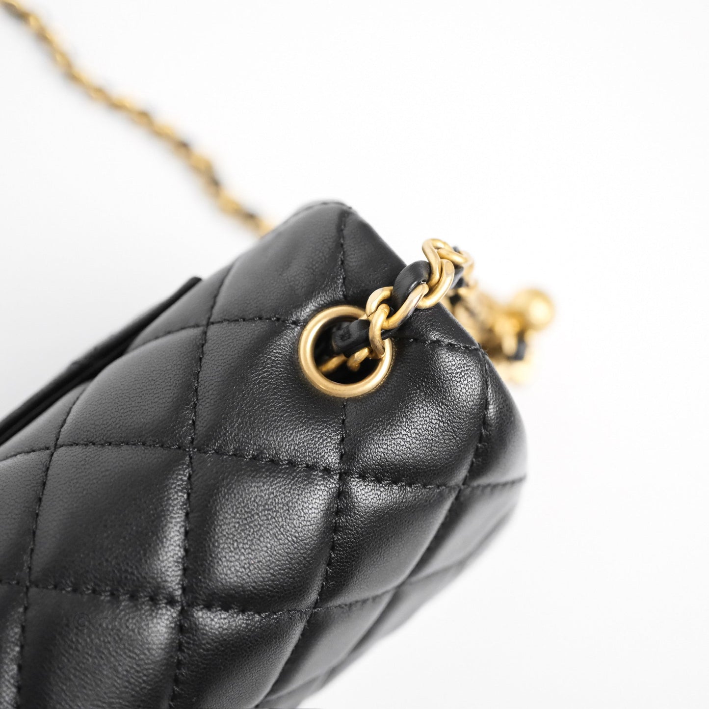 Chanel Mini Rectangular Pearl Crush Quilted Black Lambskin Aged Gold Hardware