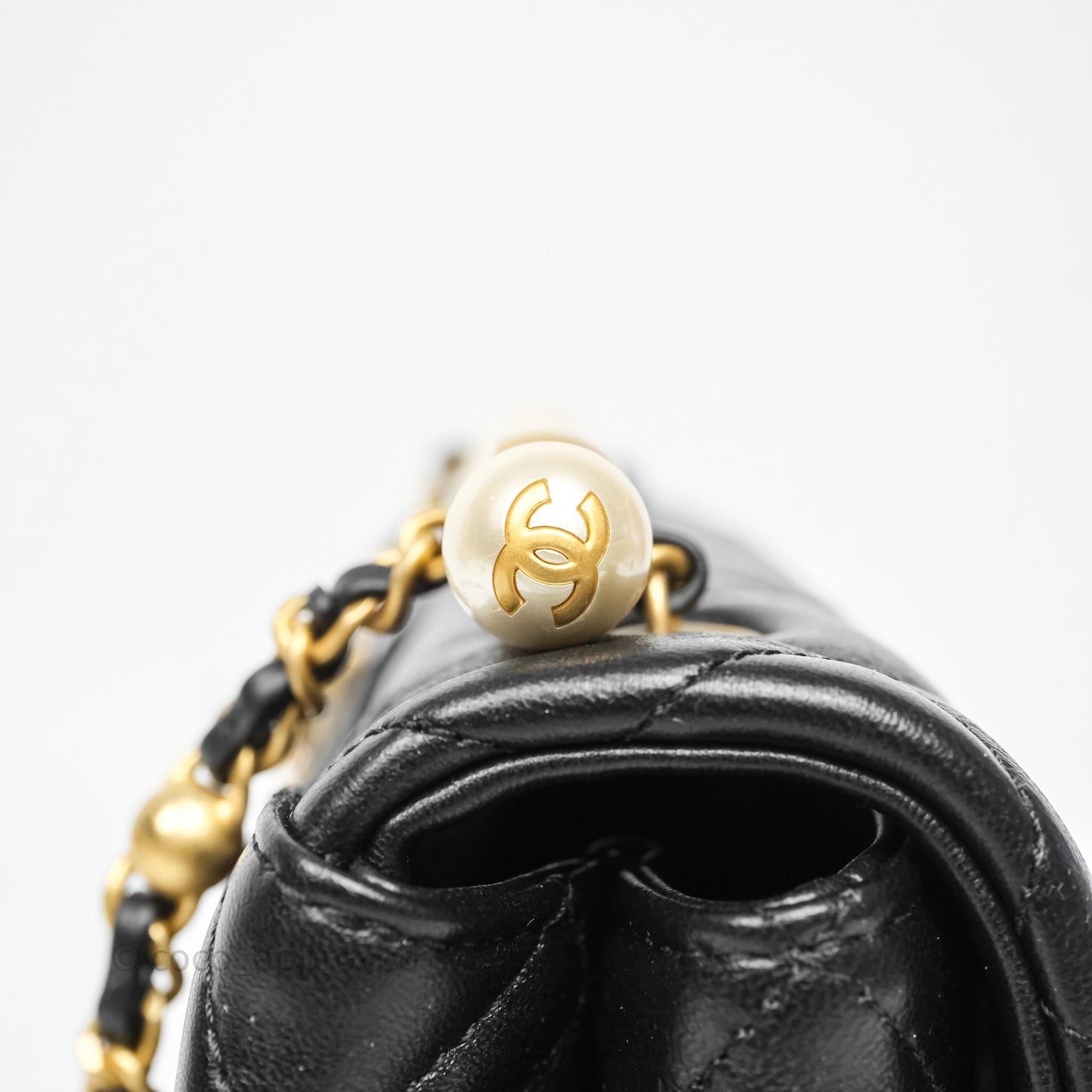 Chanel Mini Quilted Flap Bag with Pearl Top Handle Black Lambskin Aged Gold Hardware 24A