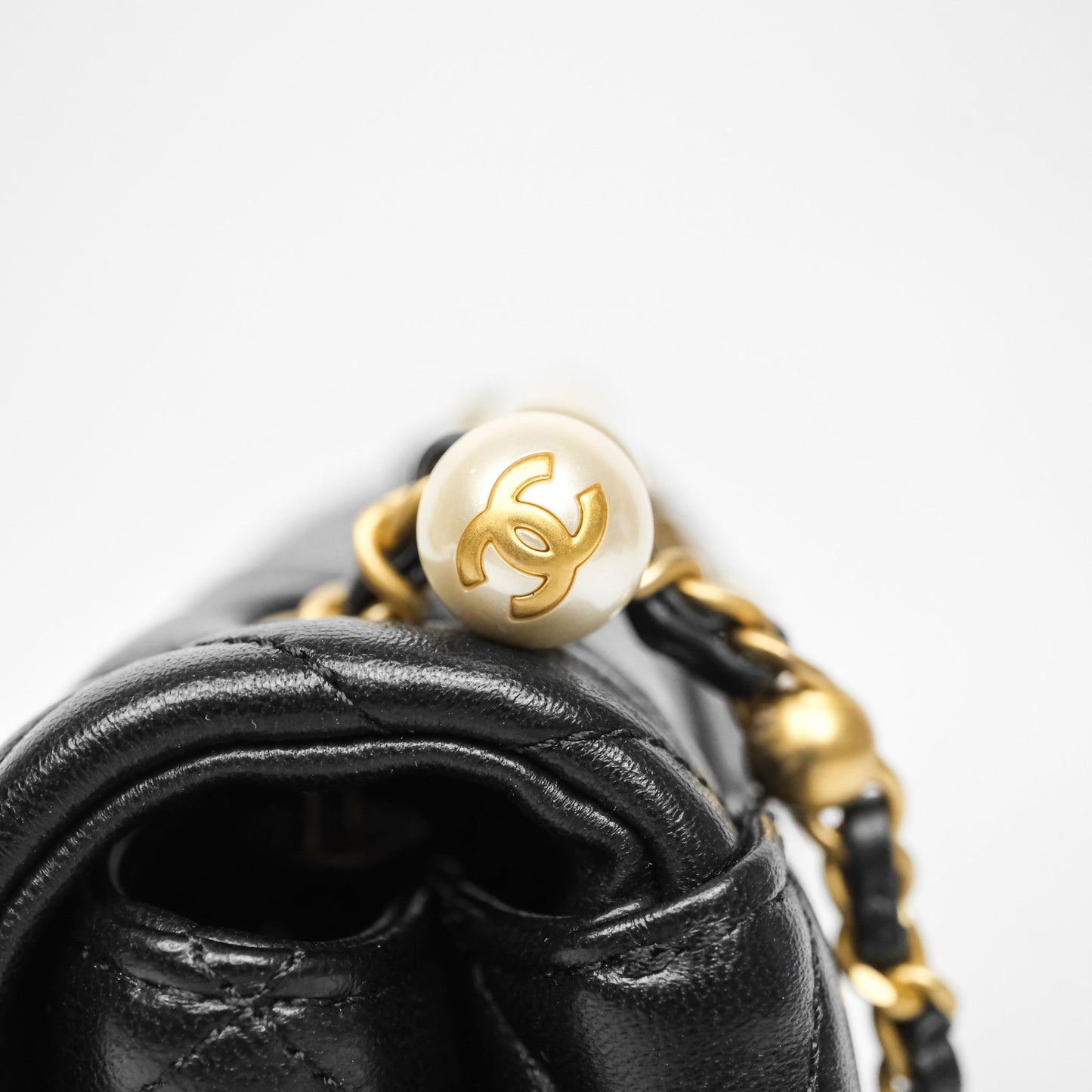 Chanel Mini Quilted Flap Bag with Pearl Top Handle Black Lambskin Aged Gold Hardware 24A