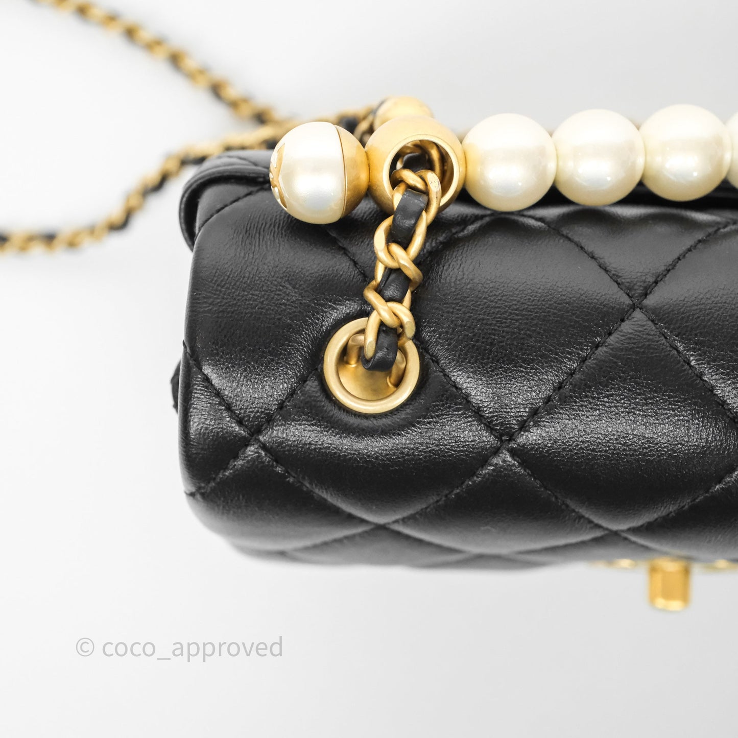 Chanel Mini Quilted Flap Bag with Pearl Top Handle Black Lambskin Aged Gold Hardware 24A