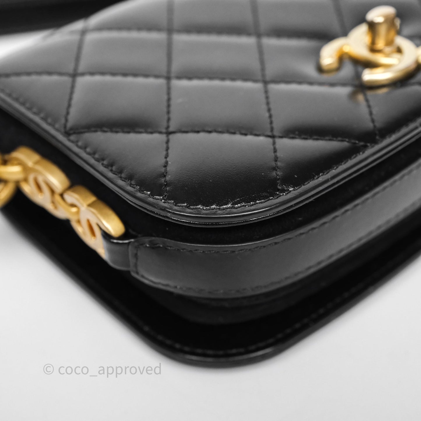 Chanel Quilted Mini Messenger with CC Logo Strap Black Shiny Calfskin/ Suede Goatskin Aged Gold Hardware