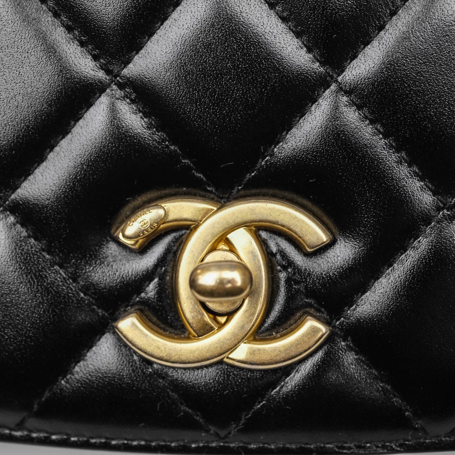 Chanel Quilted Mini Messenger with CC Logo Strap Black Shiny Calfskin/ Suede Goatskin Aged Gold Hardware