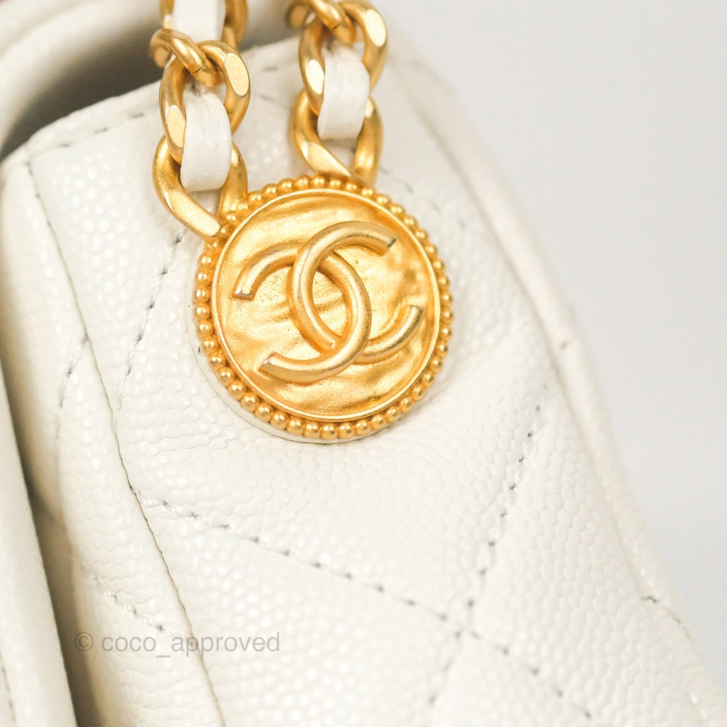 Chanel Mini Flap with Coin Charm White Caviar Aged Gold Hardware 22A