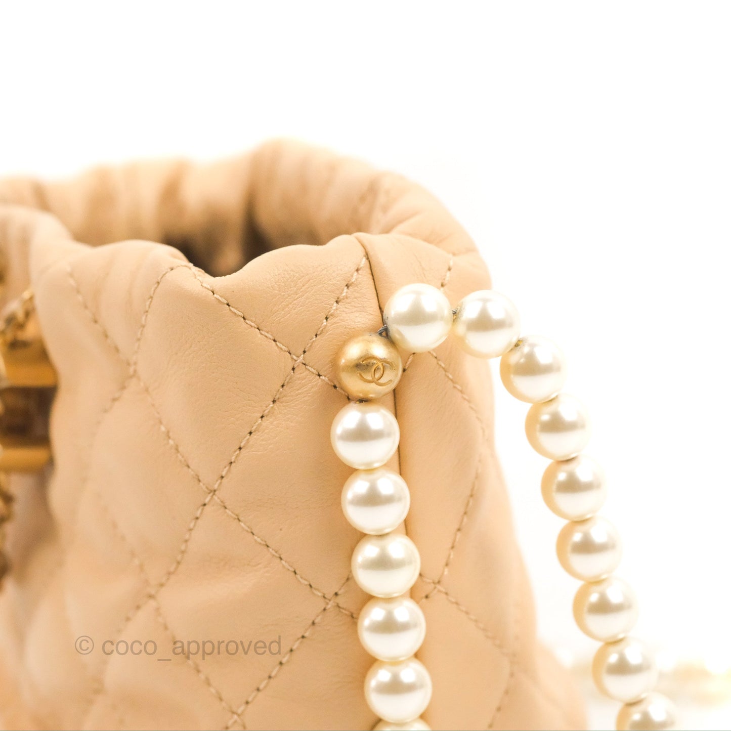 Chanel Quilted Pearl Mini About Pearls Drawstring Bucket Bag Beige Lambskin Aged Gold Hardware