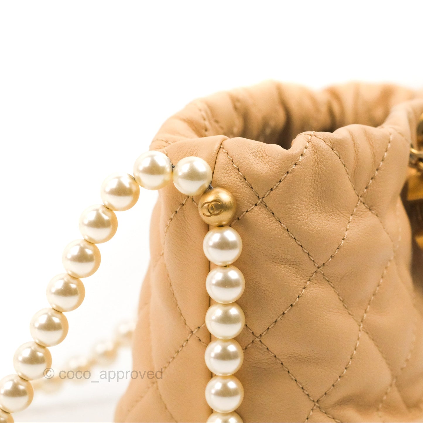 Chanel Quilted Pearl Mini About Pearls Drawstring Bucket Bag Beige Lambskin Aged Gold Hardware