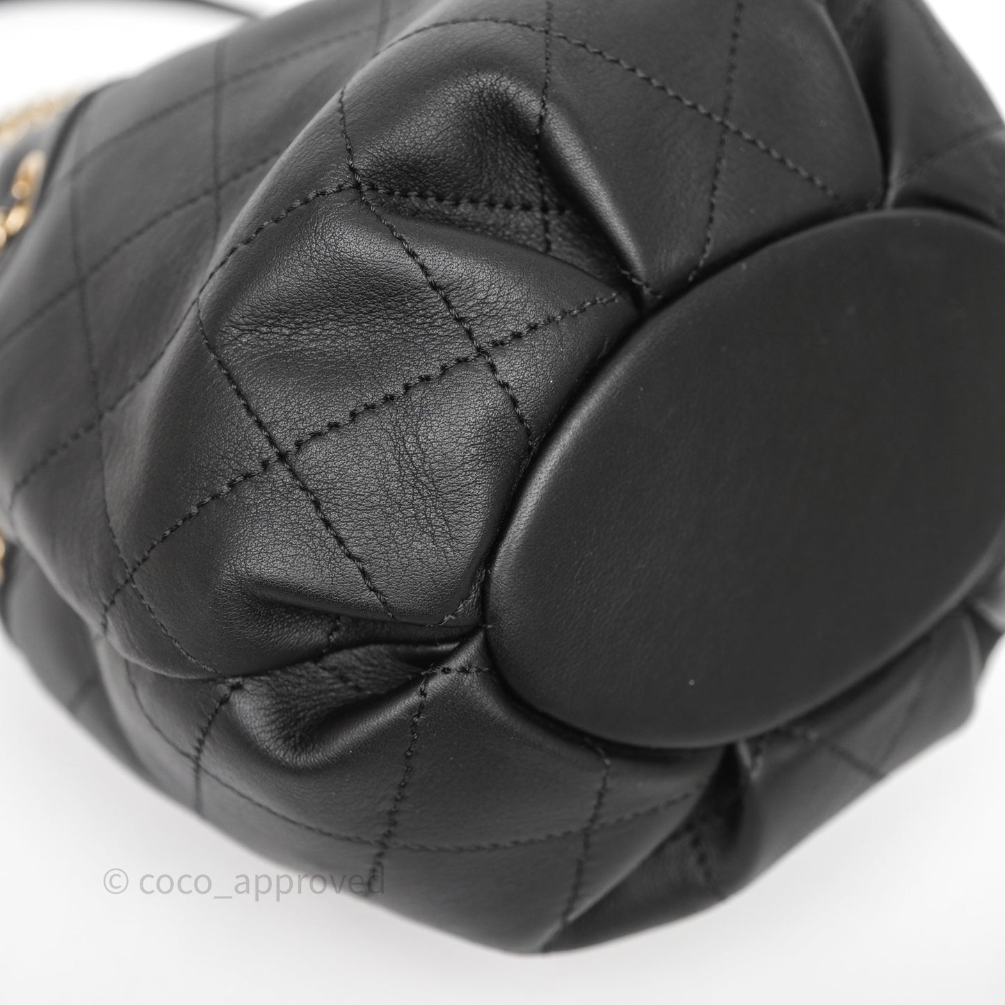 Chanel Quilted Round Drawstring Bucket Bag Black Calfskin Gold Hardware