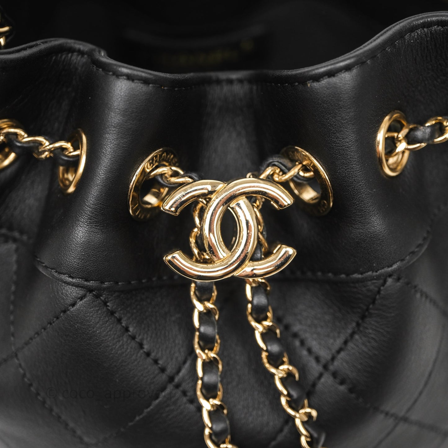 Chanel Quilted Round Drawstring Bucket Bag Black Calfskin Gold Hardware