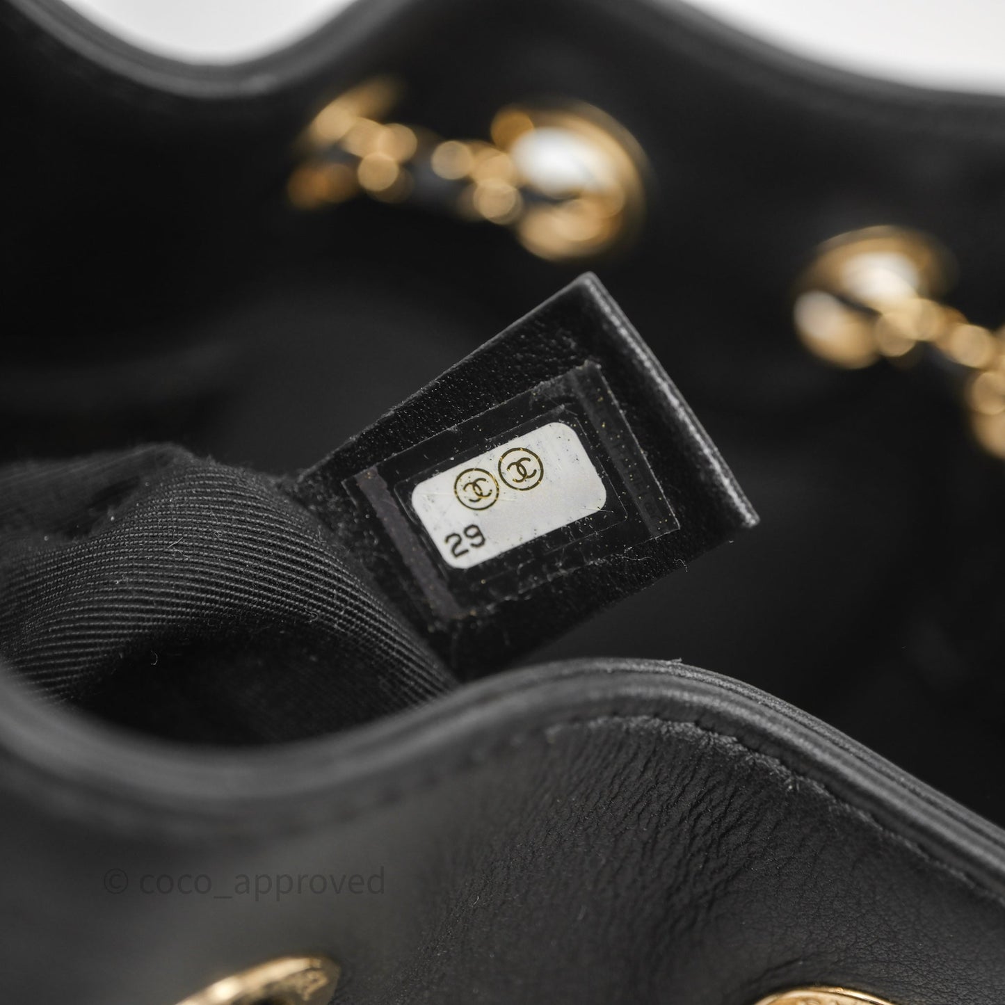 Chanel Quilted Round Drawstring Bucket Bag Black Calfskin Gold Hardware