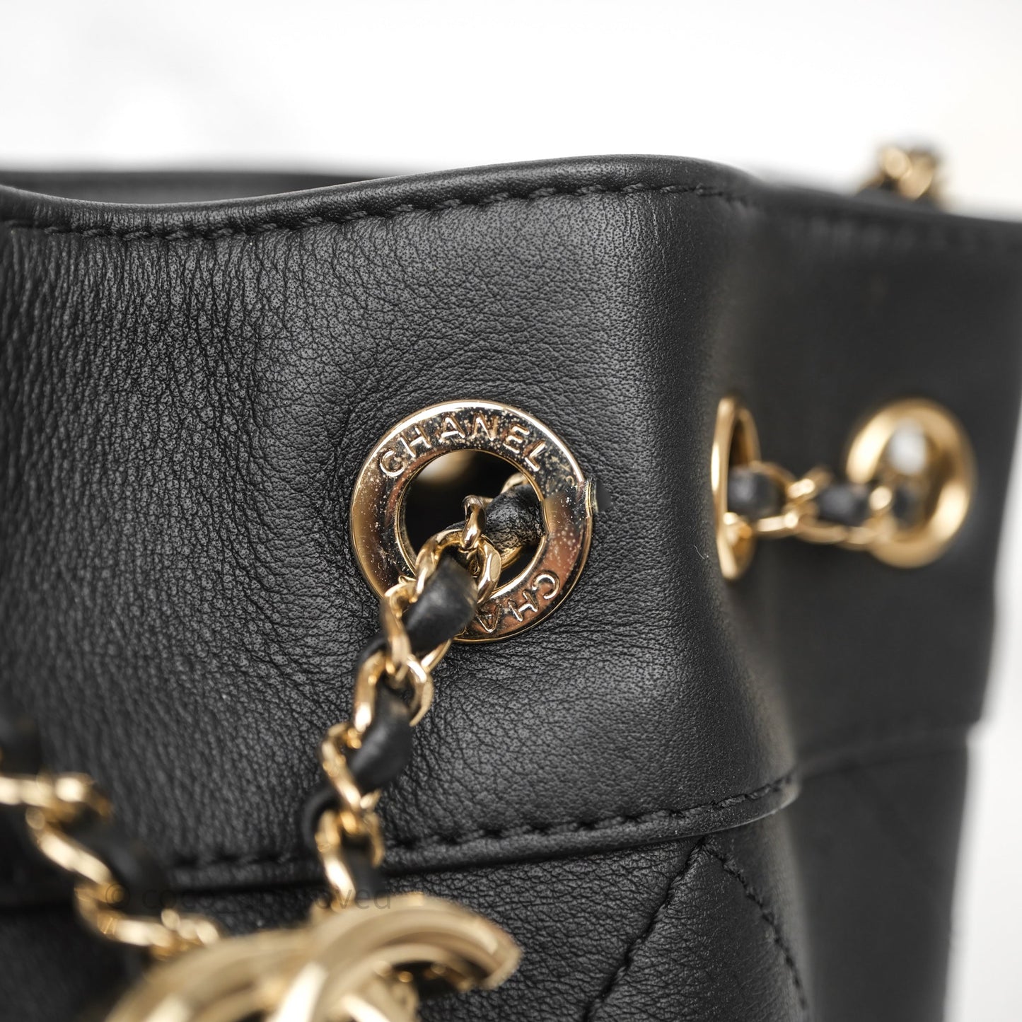 Chanel Quilted Round Drawstring Bucket Bag Black Calfskin Gold Hardware
