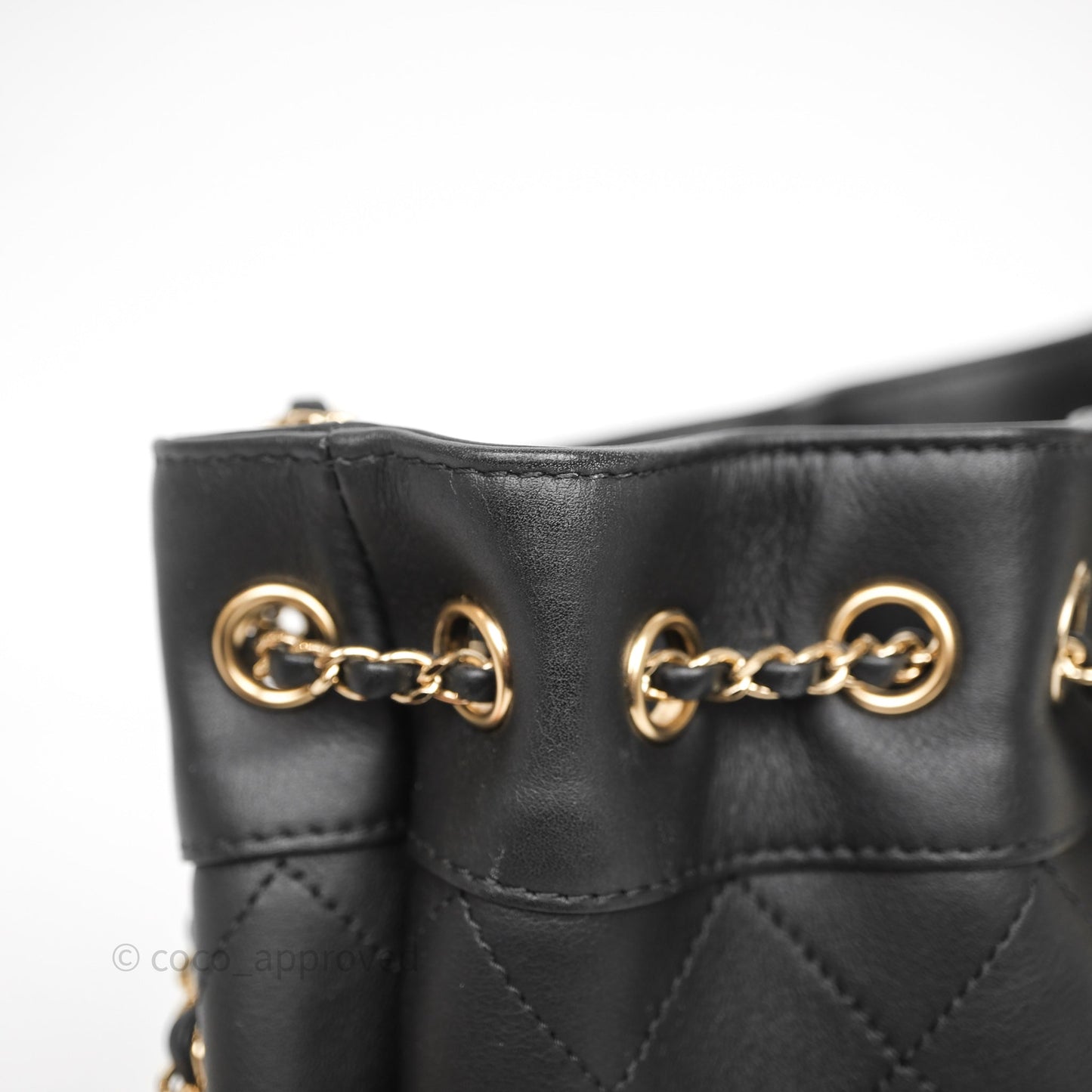 Chanel Quilted Round Drawstring Bucket Bag Black Calfskin Gold Hardware