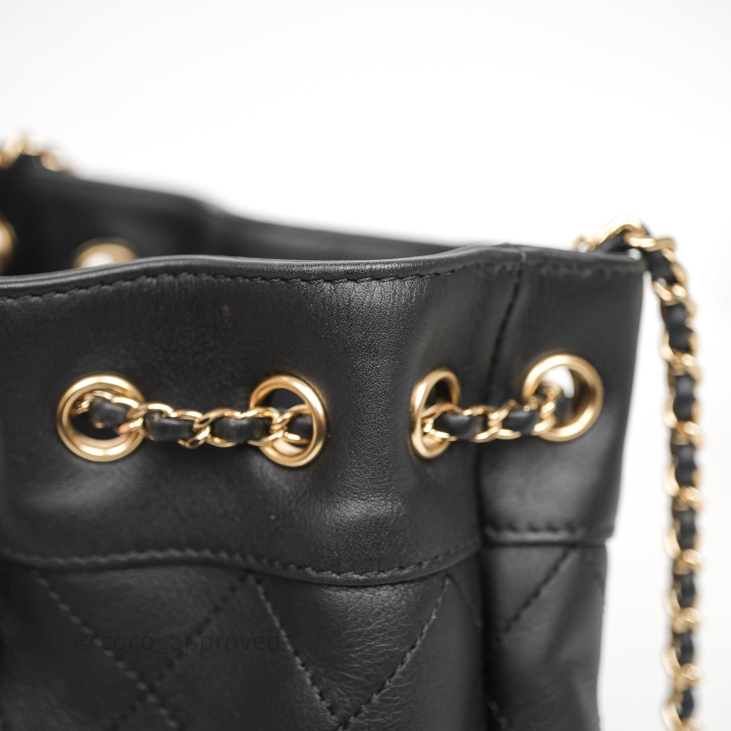 Chanel Quilted Round Drawstring Bucket Bag Black Calfskin Gold Hardware