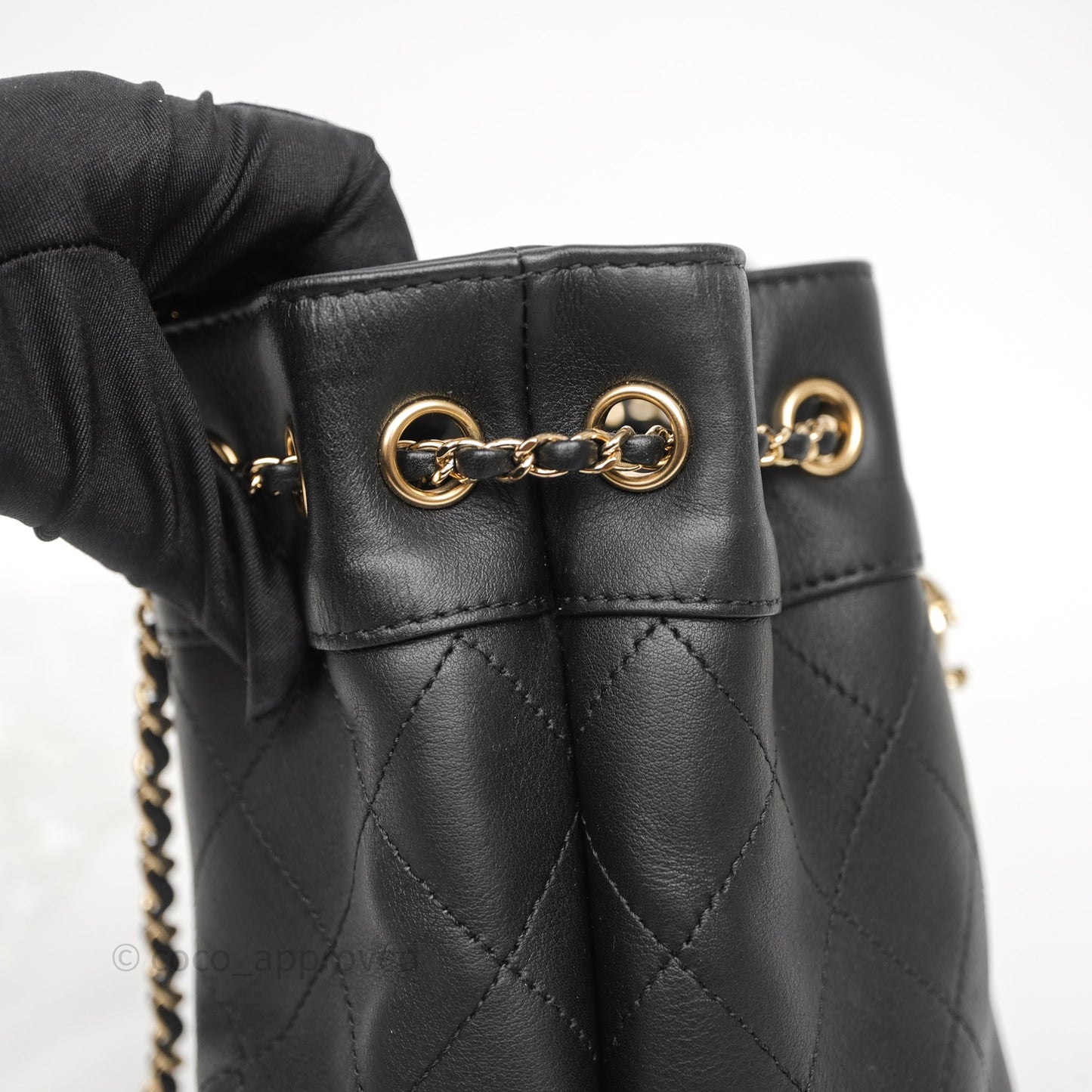 Chanel Quilted Round Drawstring Bucket Bag Black Calfskin Gold Hardware
