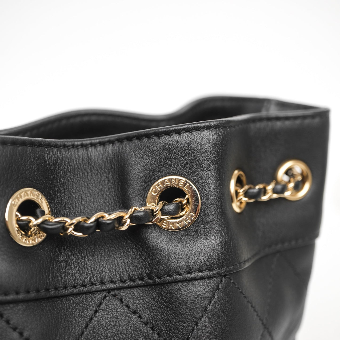 Chanel Quilted Round Drawstring Bucket Bag Black Calfskin Gold Hardware