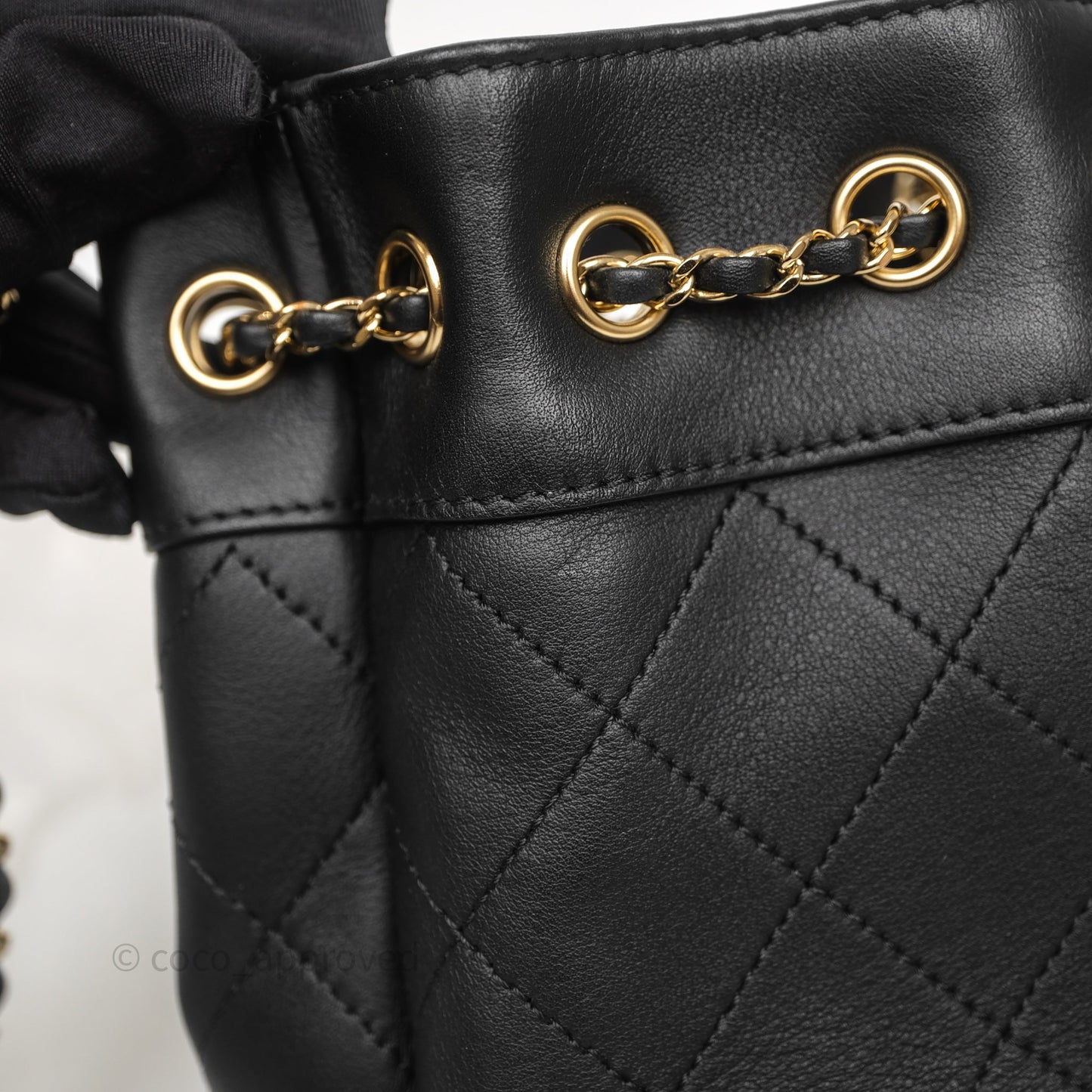 Chanel Quilted Round Drawstring Bucket Bag Black Calfskin Gold Hardware