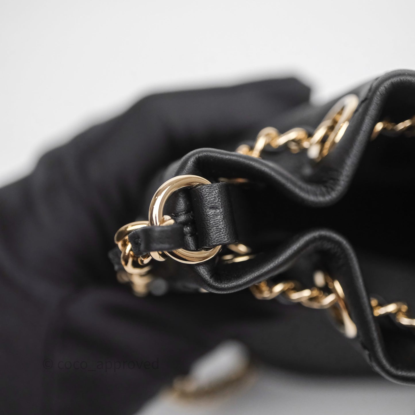 Chanel Quilted Drawstring Bucket Bag Black Calfskin Gold Hardware