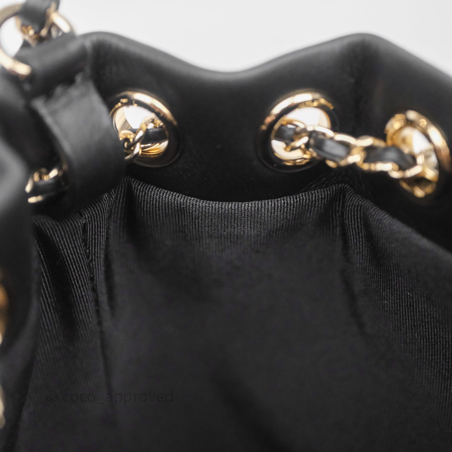 Chanel Quilted Drawstring Bucket Bag Black Calfskin Gold Hardware