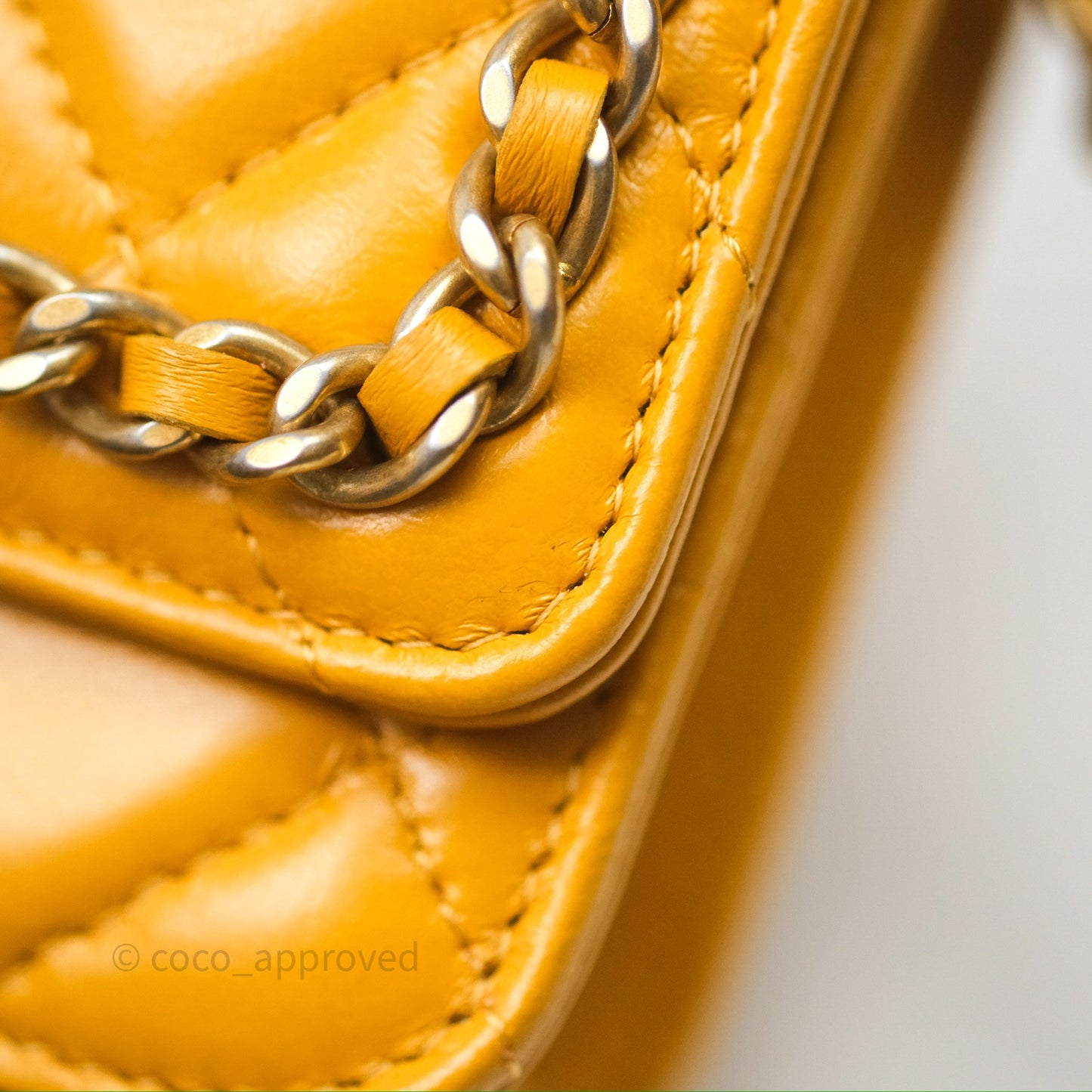 Chanel Quilted Classic Chain Around WOC Yellow Lambskin Aged Gold Hardware