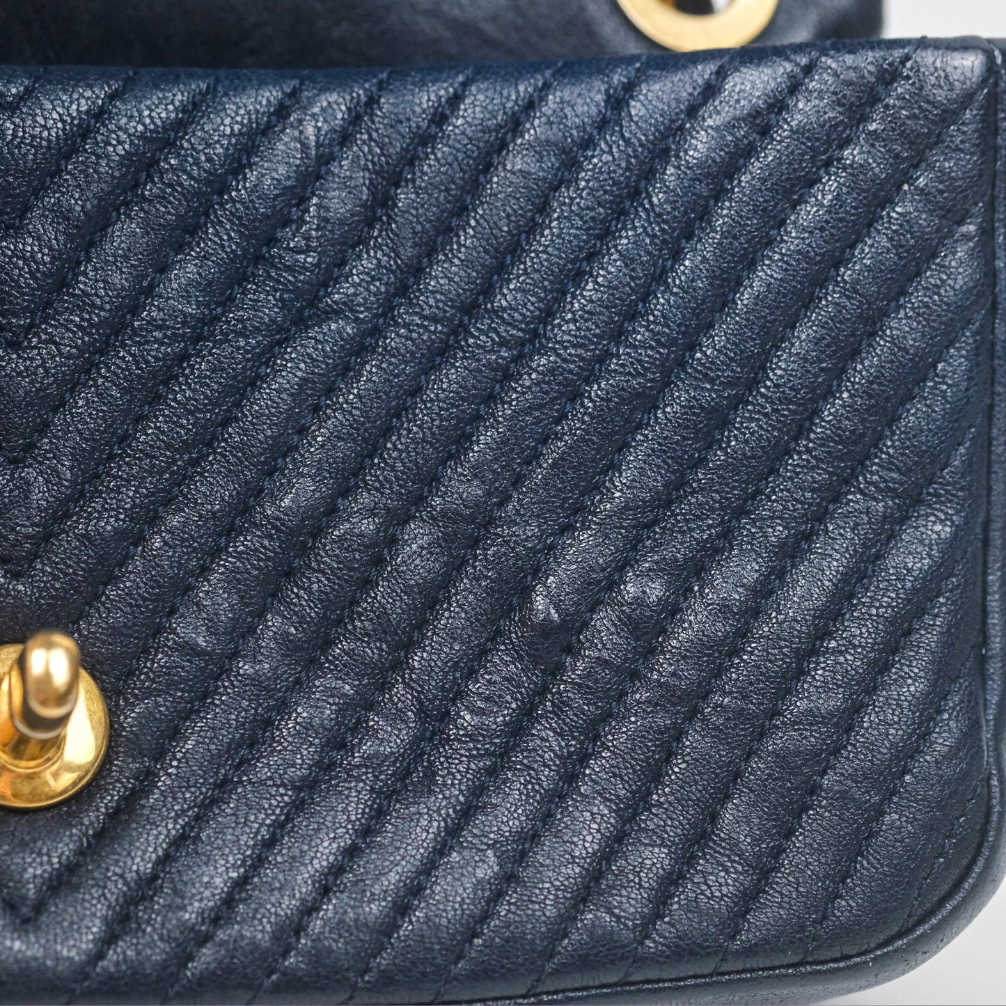 Chanel Small Chevron Surpique Flap Navy Calfskin Aged Gold Hardware