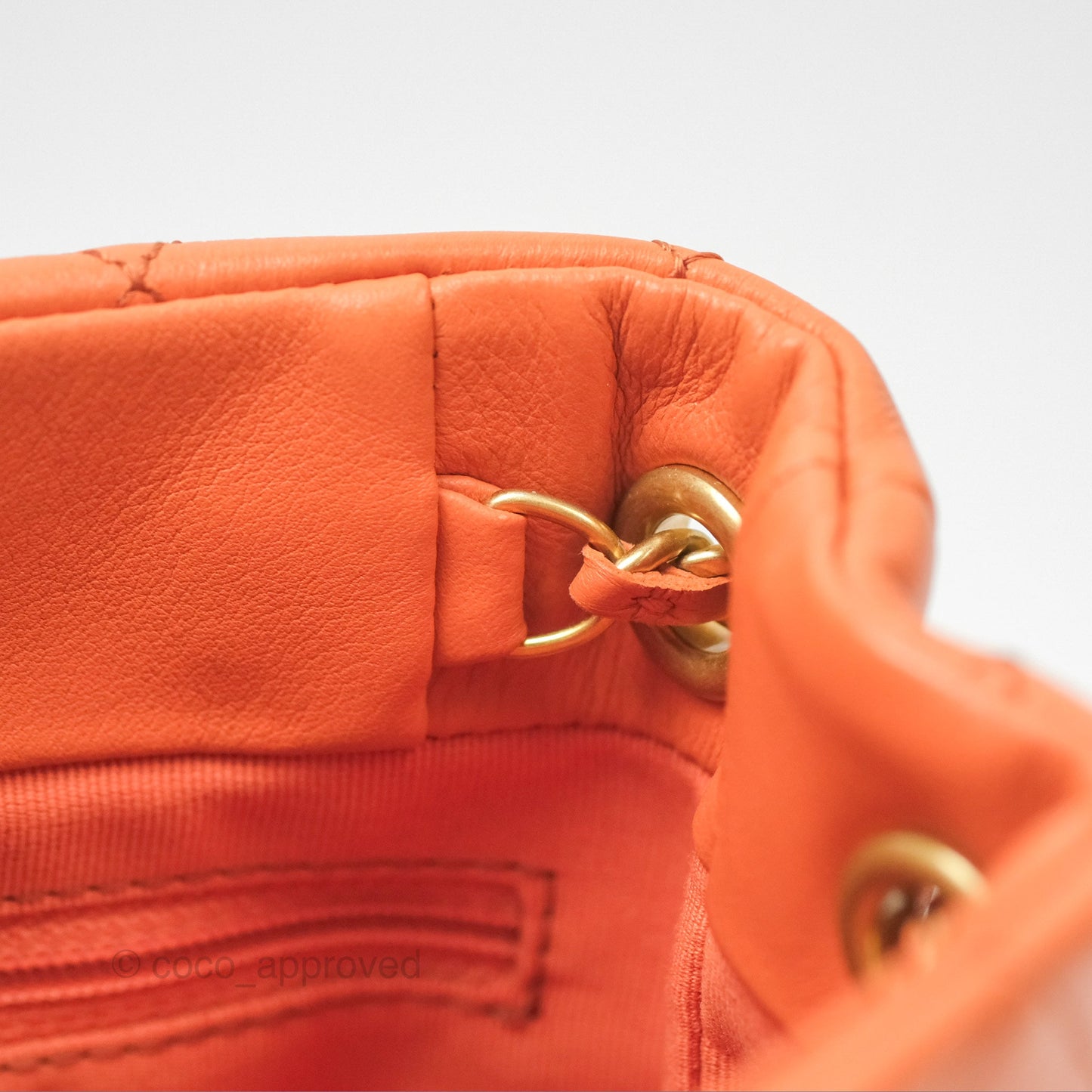 Chanel Small Drawstring Backpack Orange Calfskin Aged Gold Hardware 23A