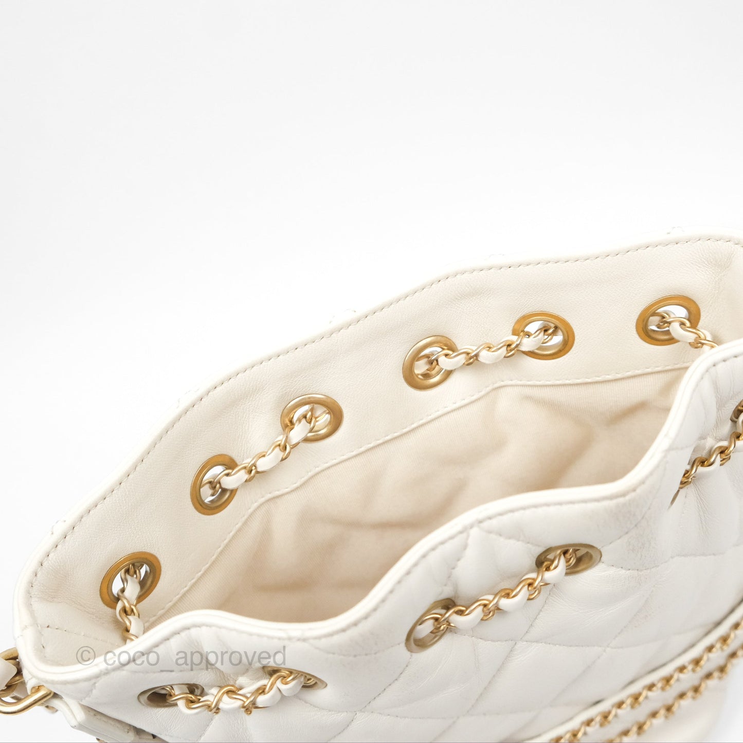 Chanel Quilted Drawstring Bucket Bag Ivory Lambskin Aged Gold Hardware