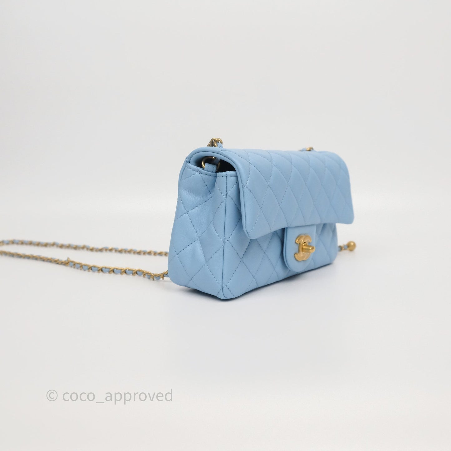 Chanel Mini Rectangular Pearl Crush Quilted Sky Blue Lambskin Aged Gold Hardware