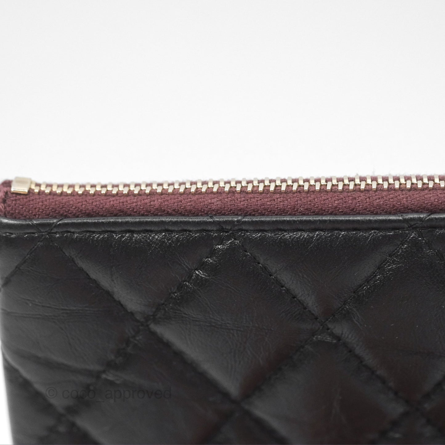 Chanel Quilted Mini Reissue O Case Black Calfskin Aged Gold Hardware