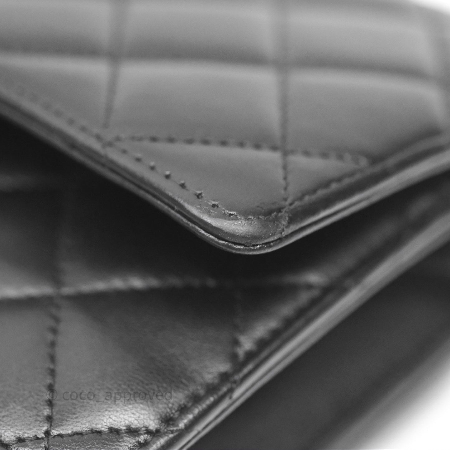 Chanel Quilted WOC Black Lambskin Silver Hardware