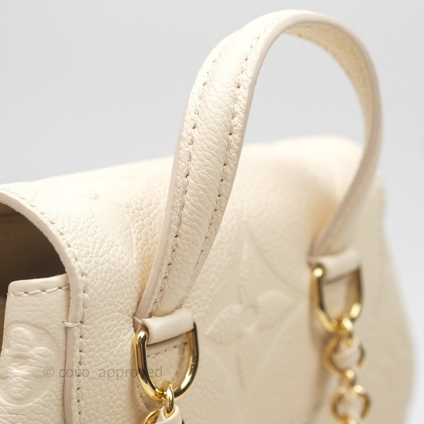 Louis Vuitton Backup Cream Monogram Empreinte Leather