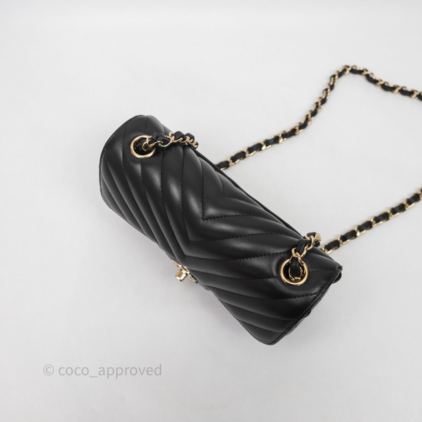 Chanel Quilted Mini Rectangular Chevron Black Lambskin Gold Hardware