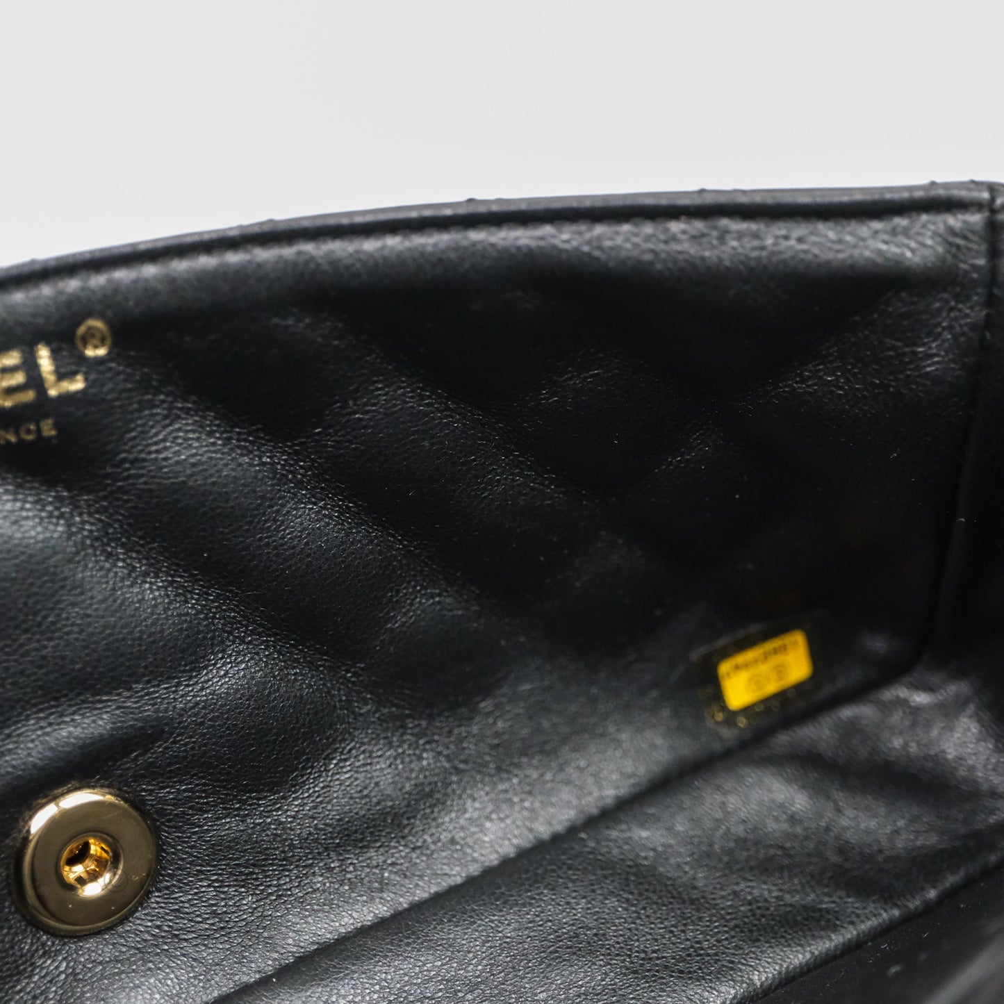 Chanel Quilted East West With Charm Flap Bag Lambskin Black Gold Hardware