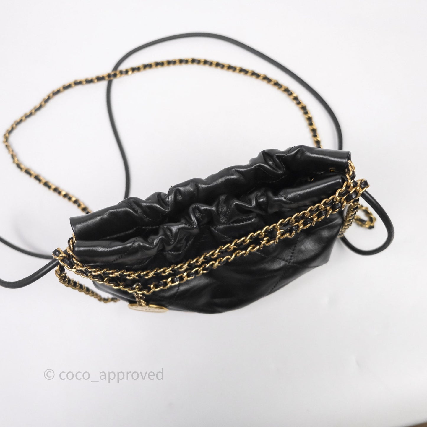 Chanel 22 Mini Bag Black Crumpled Calfskin White Lacquered Metal Logo